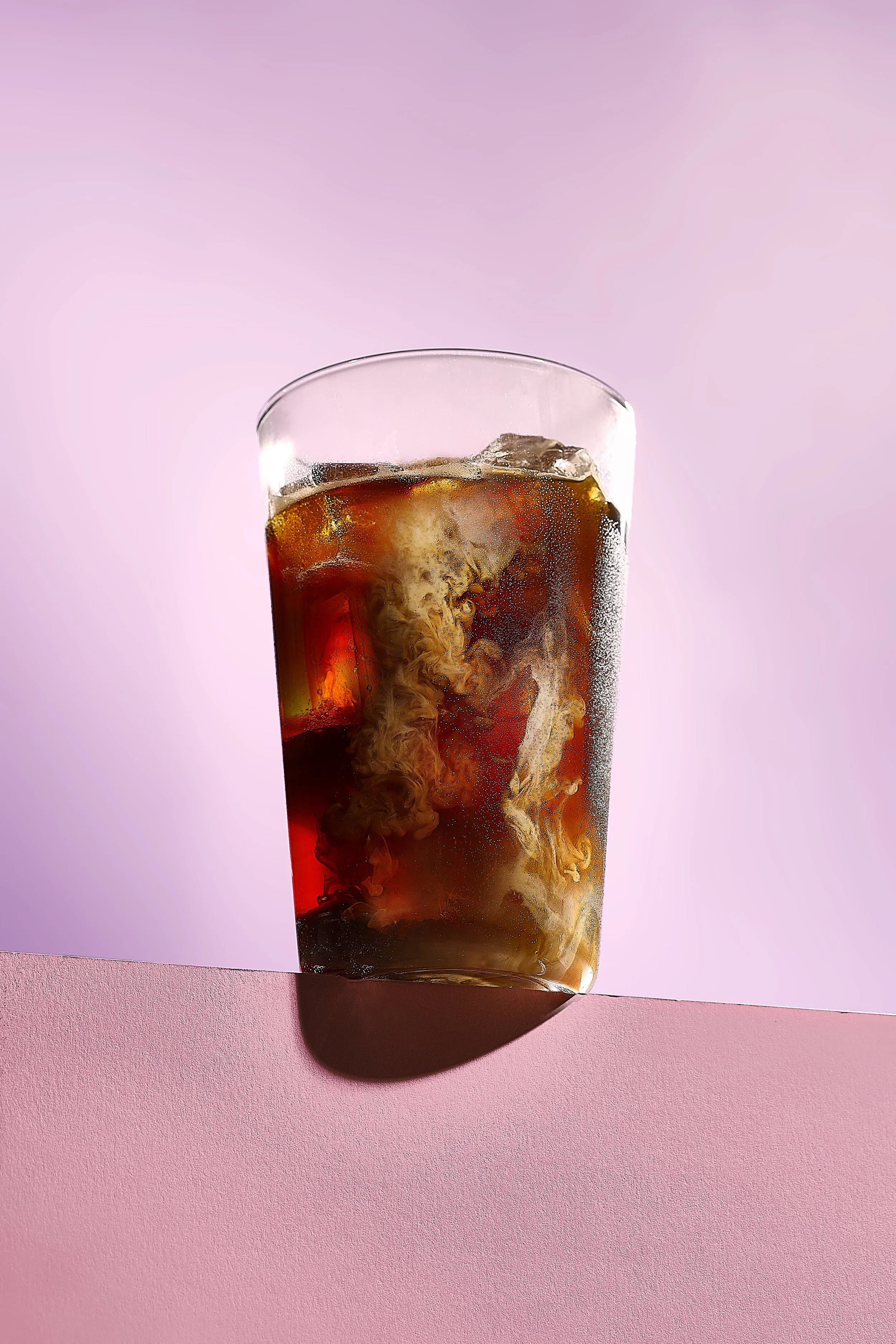 Sarah Ghijselinck, drink stylist, Gent, A glass of iced coffee with swirling cream.