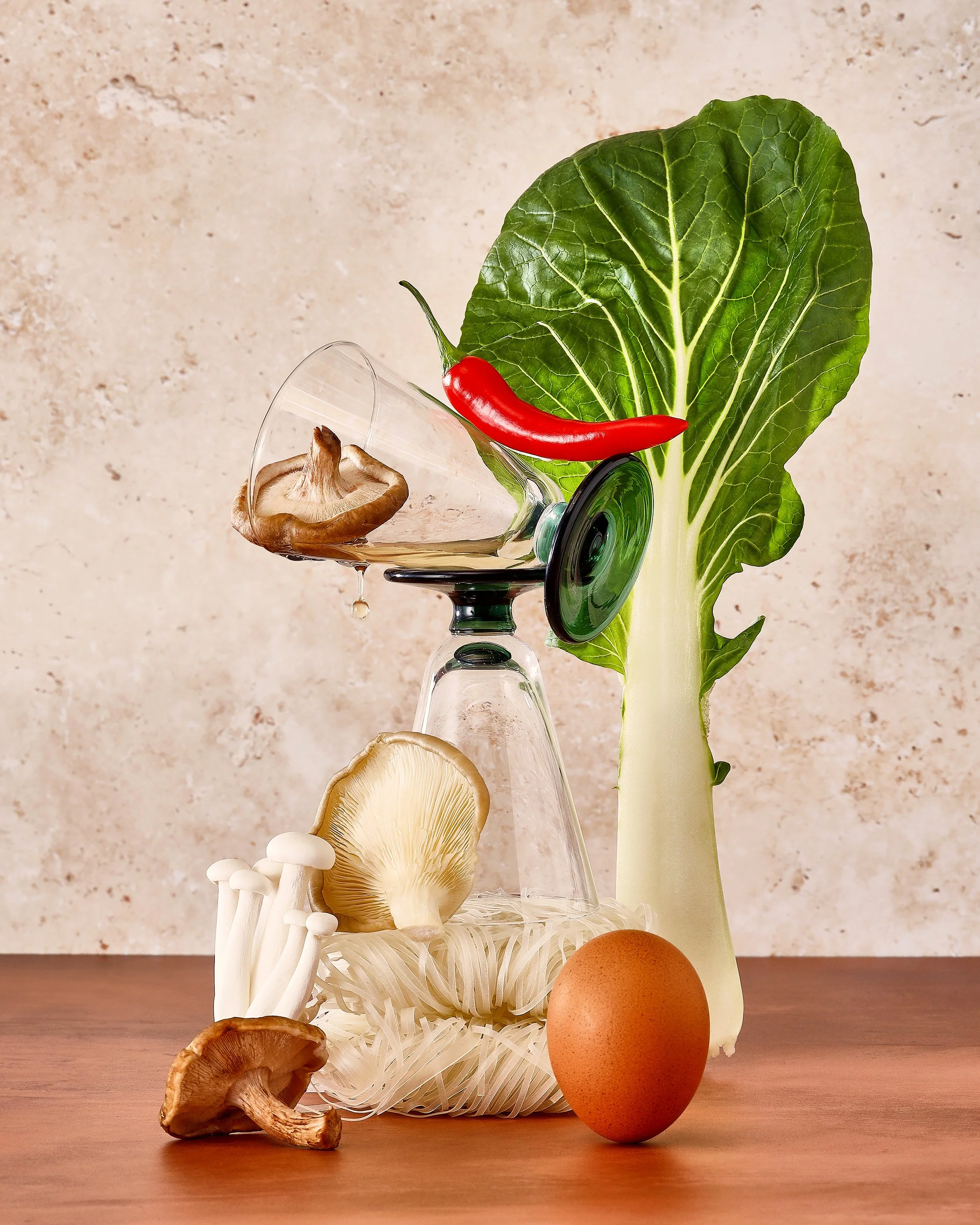 Sarah Ghijselinck, food and drink stylist, art direction, recipe development, Gent, Assorted vegetables arranged with an upside-down glass for cuvée canon, wine bar