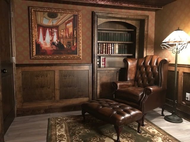 Leather wing chair and footstool