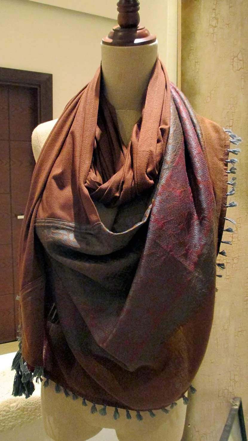Combination of keffiyeh the traditional Jordanian\Palestinian scarf with a very soft fabric and tassels.