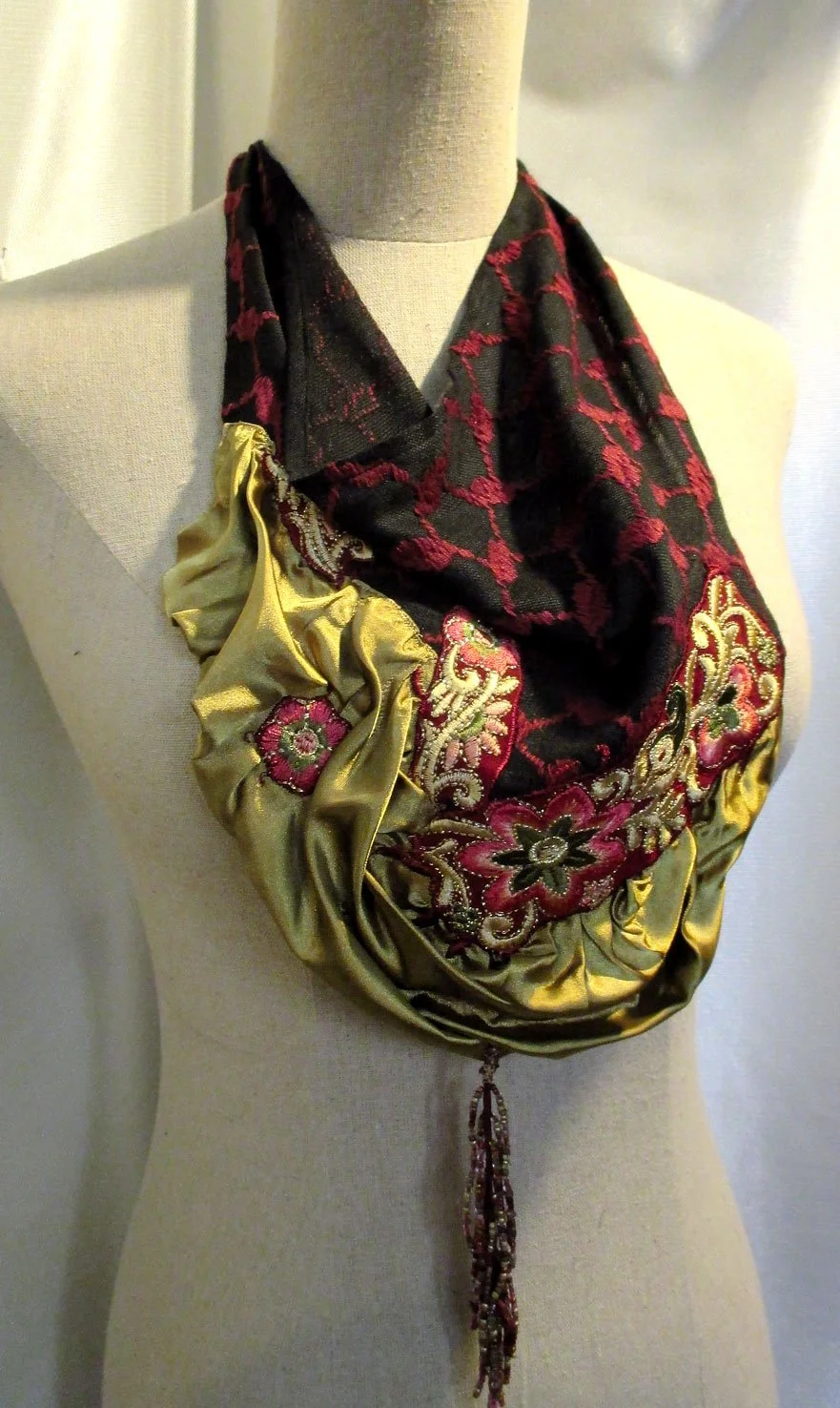 Embroidery and beads on fabrics, this strange collar plays with textiles, embroidery, beading, fringe cuts, and a touch of madness, made in Jordan, must see in Amman