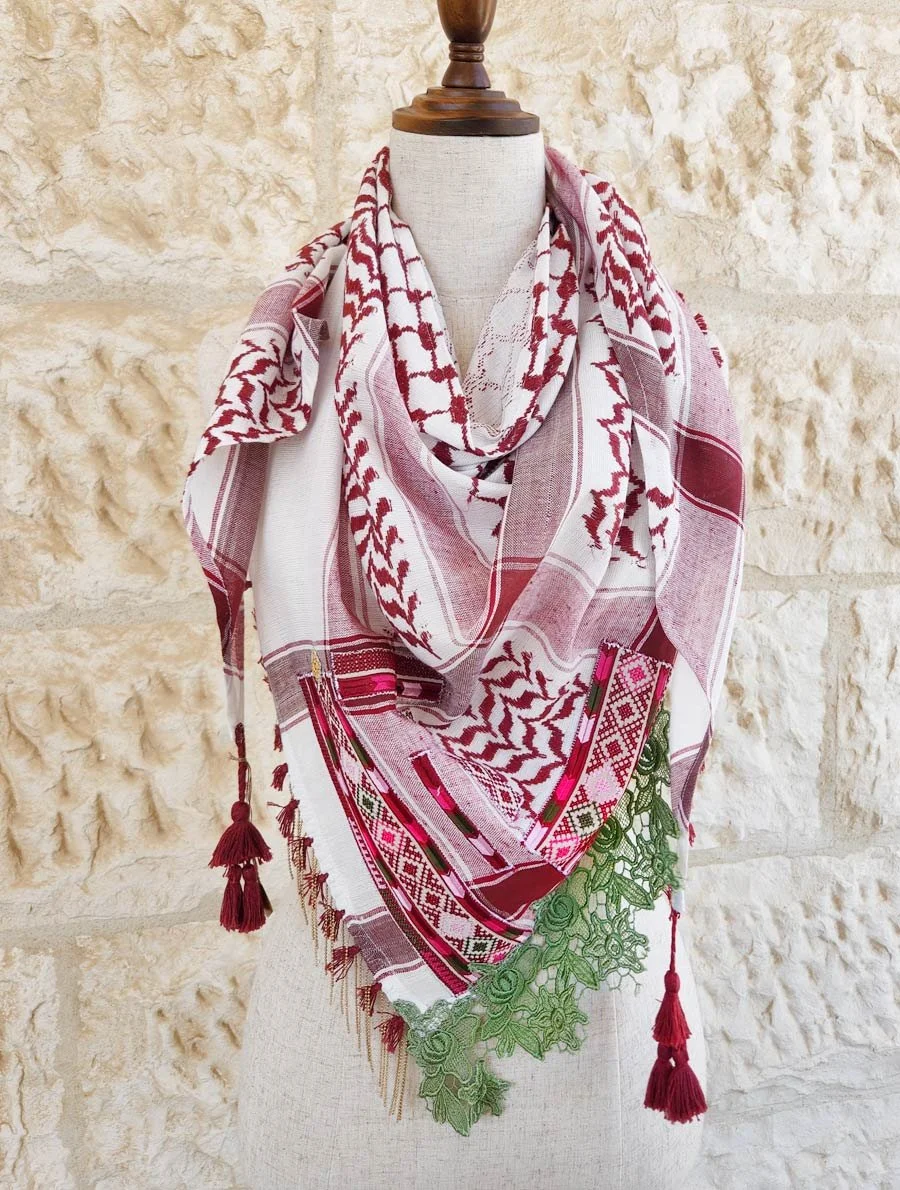 Mixture of keffiyeh with Palestinian embroidery, textiles and tassels; all together to create this beauty