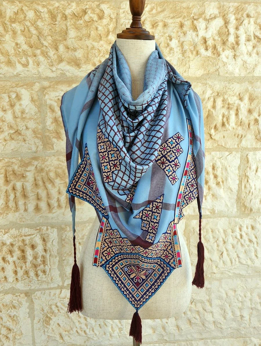 Combination of keffiyeh the traditional Jordanian\Palestinian scarf with Palestinian Embroidery and tassels.