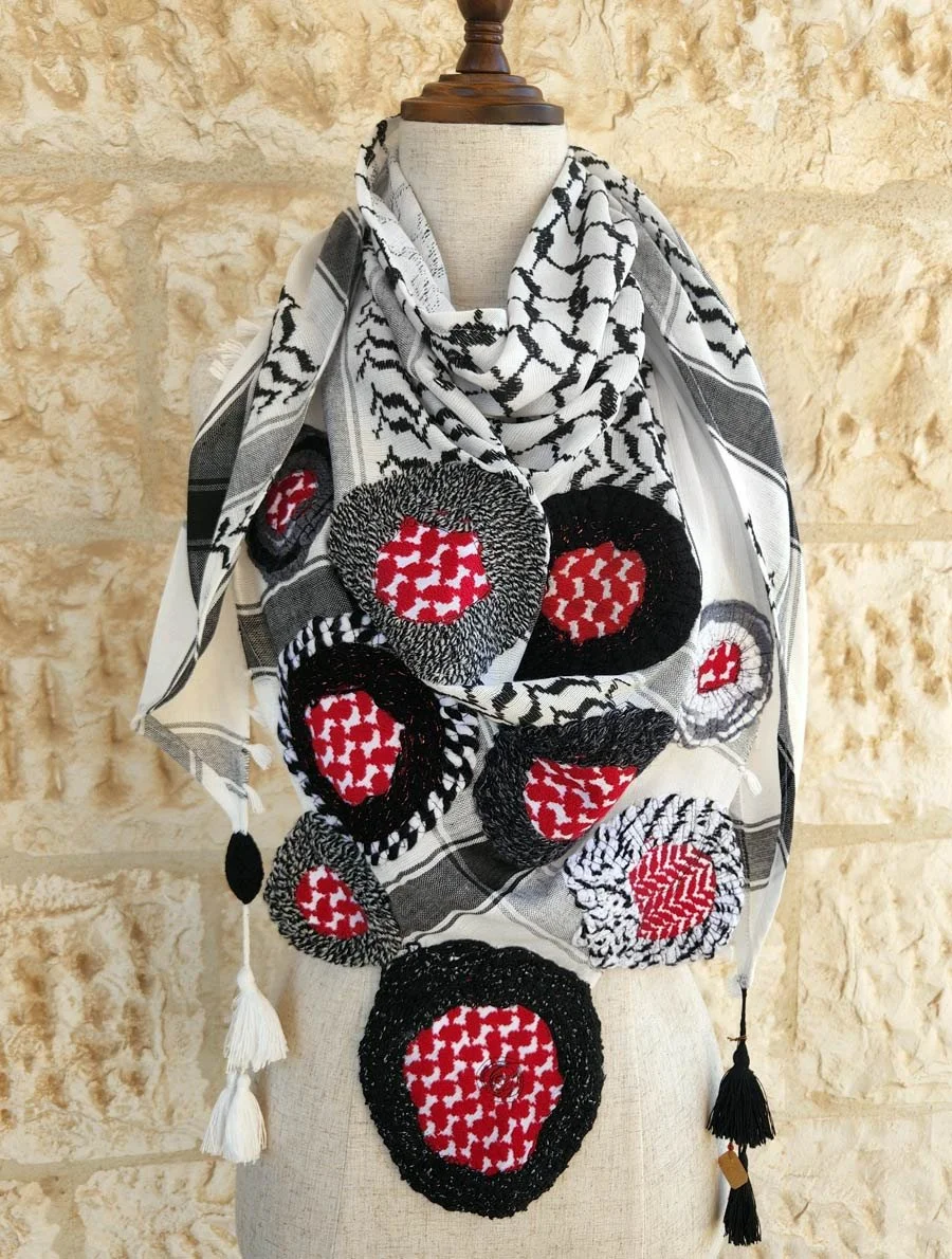 Fsion of colors, patterns, textiles. All played together to create this alluring scarf. Orbs beautifully arranged on a Keffiyeh fabric