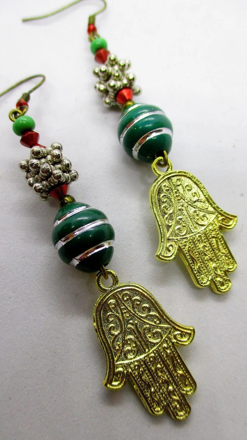 Earring has the interesting Hand of Fatima charm with beads