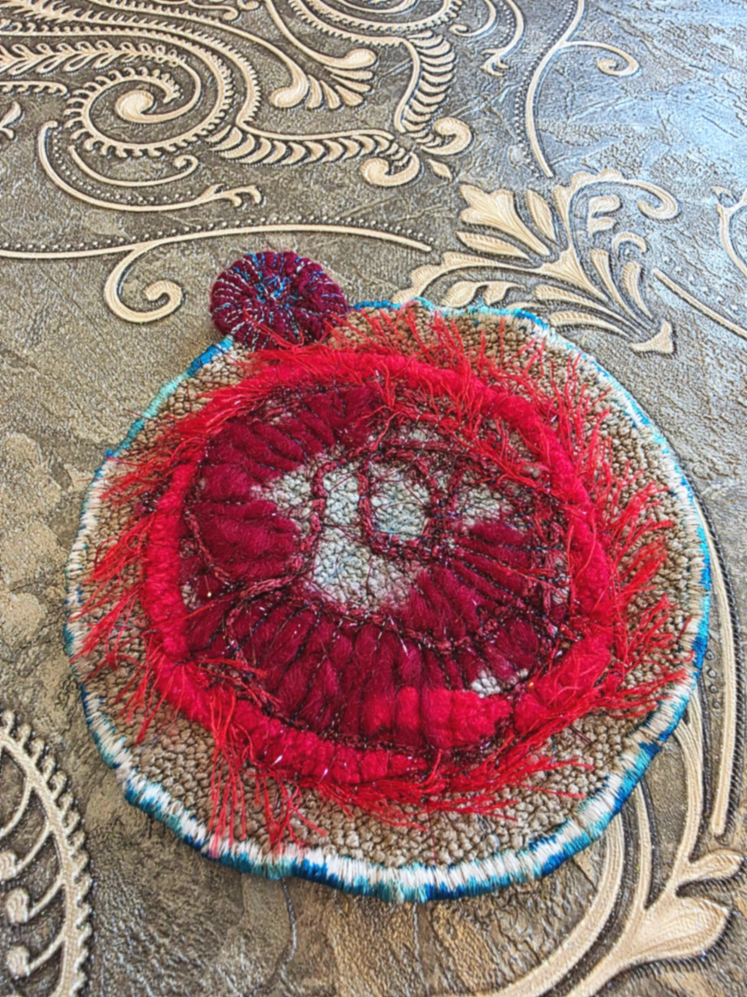 a touch of artisanal charm to your daily essentials with our handcrafted round pouch., unique blend of eco friendly high-quality fabrics and textured threads. made in Jordan