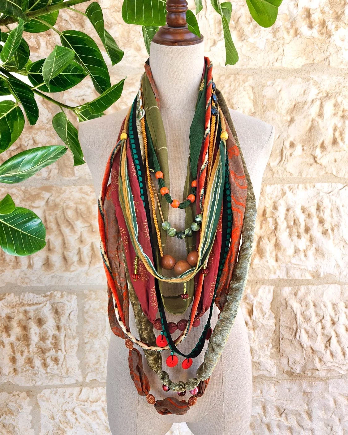 Trendy women's large multi-layered fabric necklace create from many textiles and ropes with lots of beads , it's a statement piece of art necklace