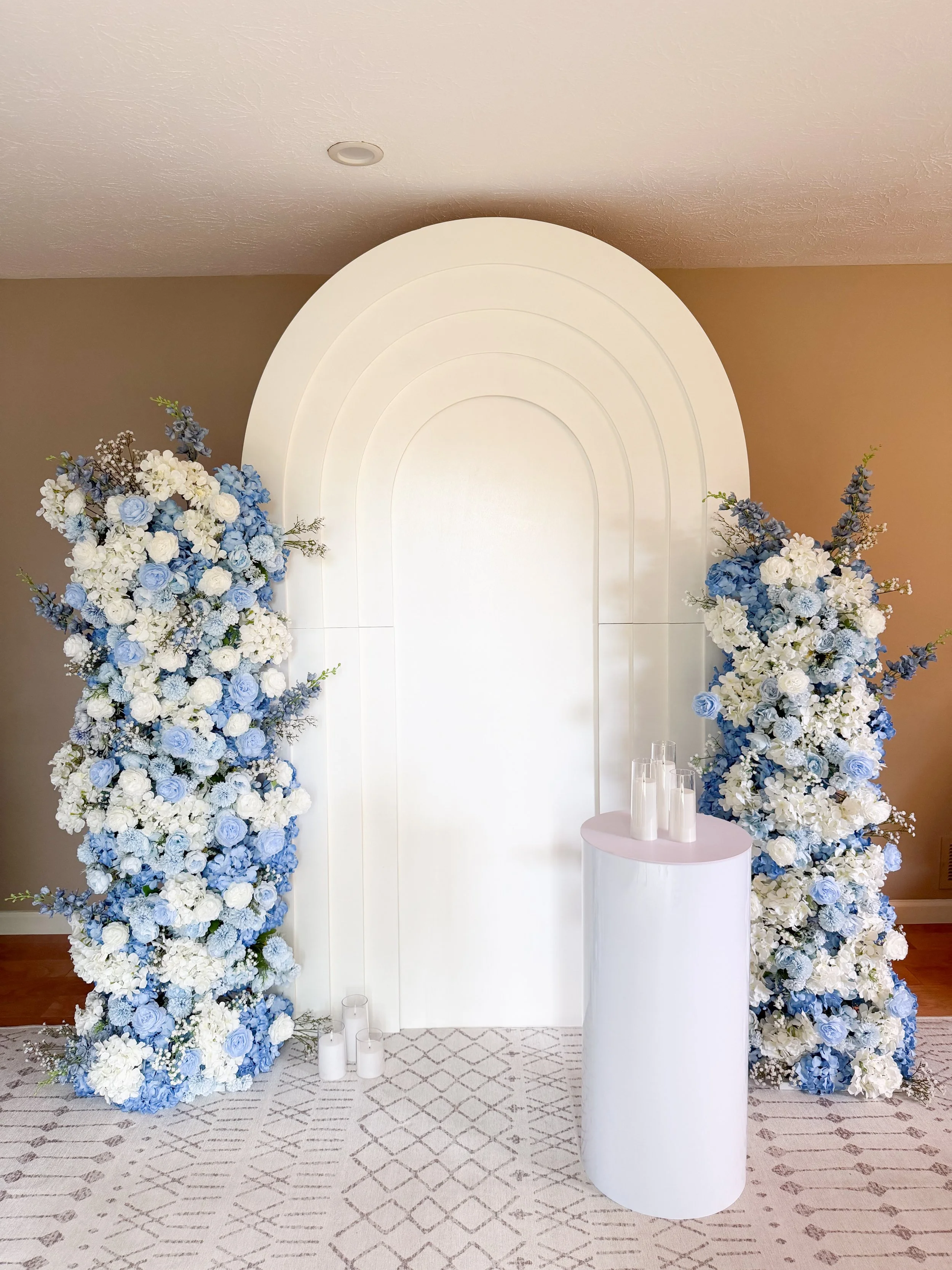 Elegant 2D floral balloon backdrop by Bow Balloons for a baby shower event in Ohio featuring soft blue and white florals.