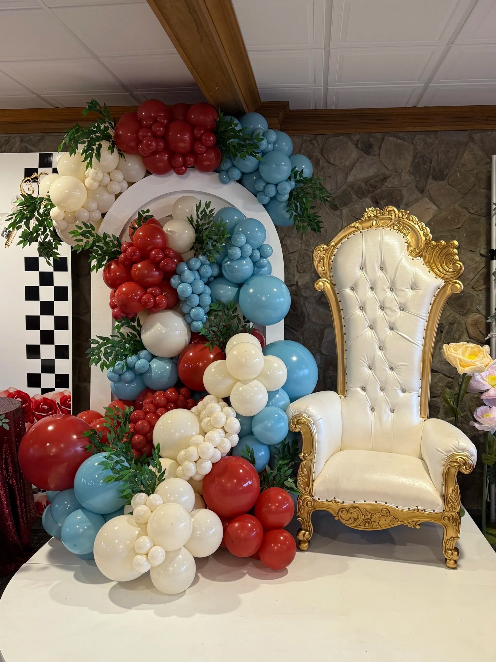 Flowing organic balloon garland creating a stunning photo backdrop for events in Northeast Ohio.