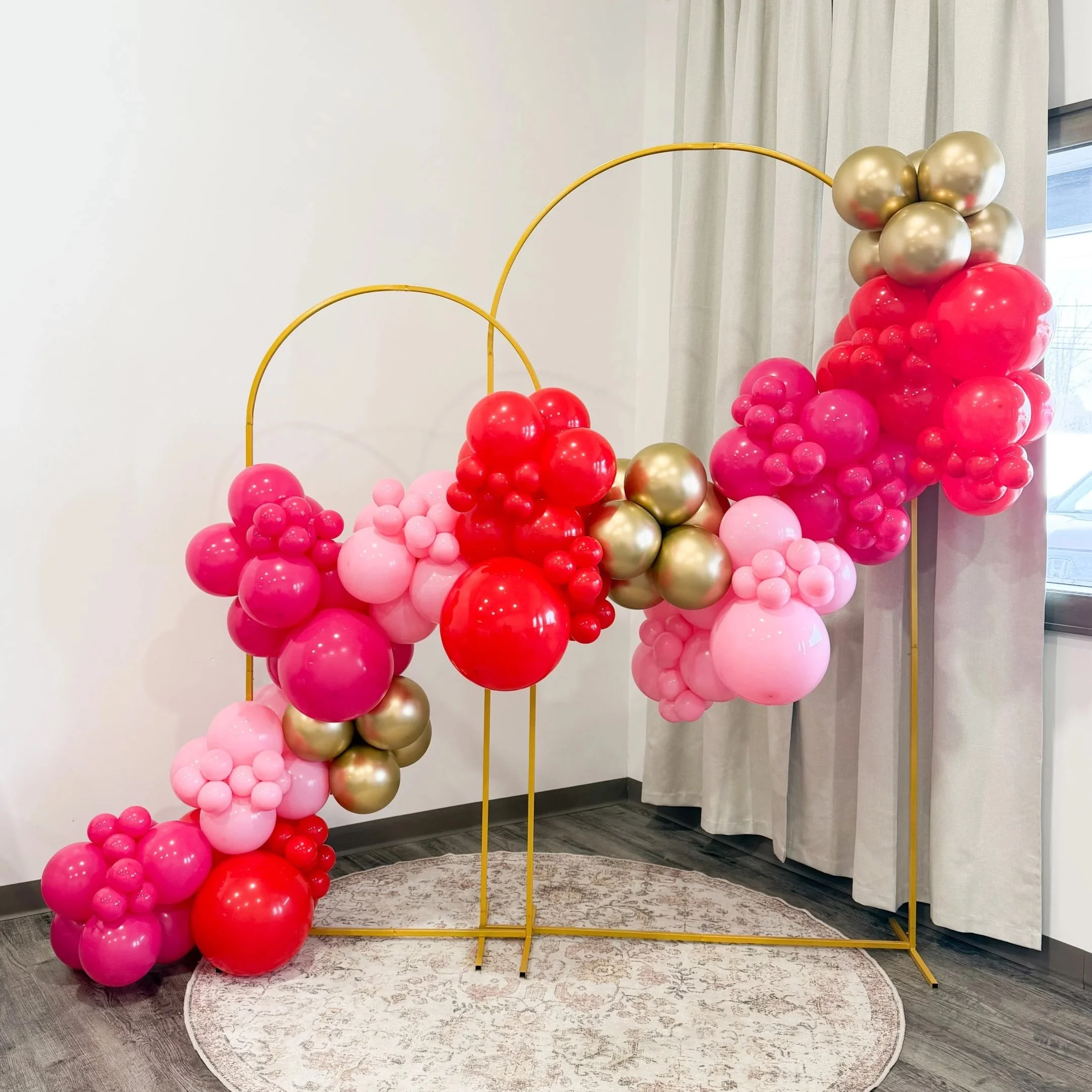 Luxury organic balloon garland installation for an event in Northeast Ohio