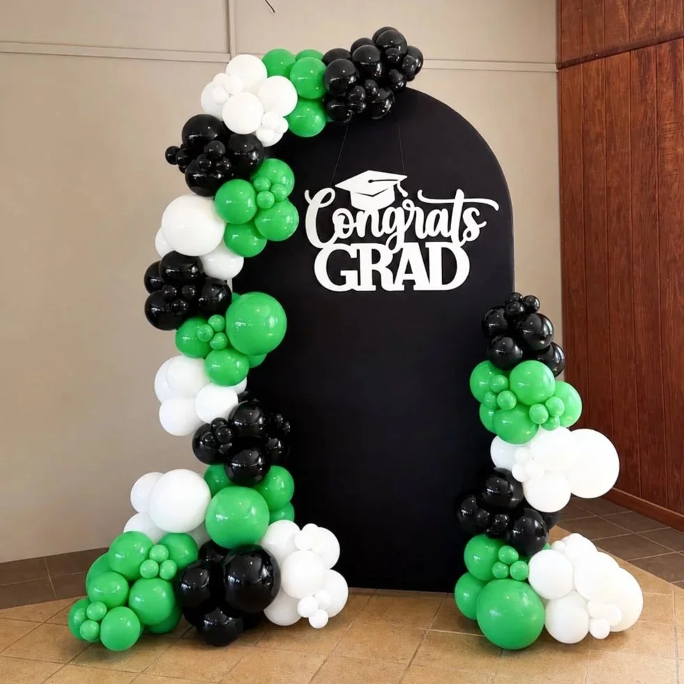 Custom graduation balloon garland designed for a graduation celebration in Northeast Ohio. Professional balloon décor serving Macedonia, Hudson, Akron, Cleveland, and surrounding areas.