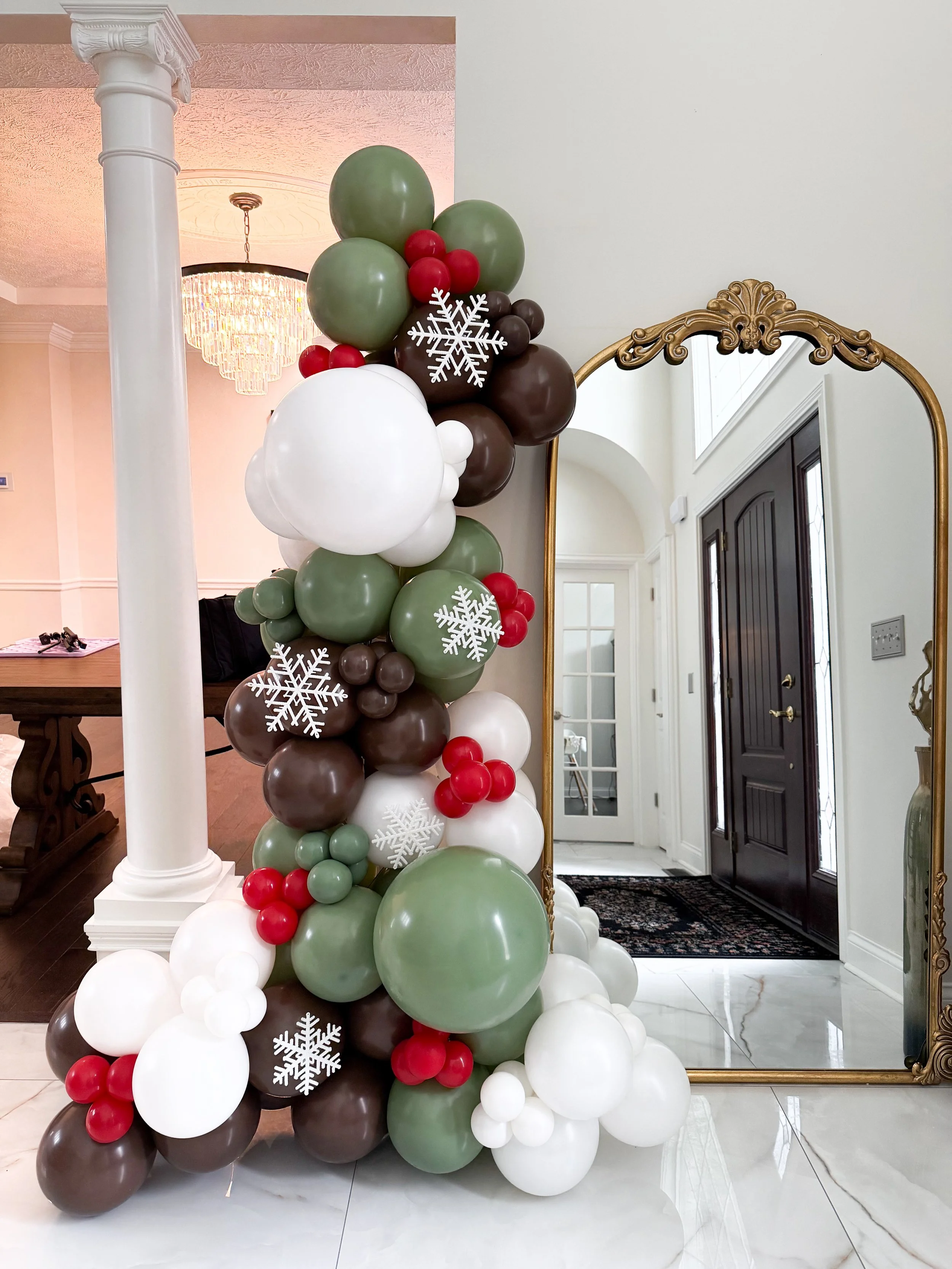 Free-standing balloon decoration for a first birthday celebration in Westlake, Ohio.