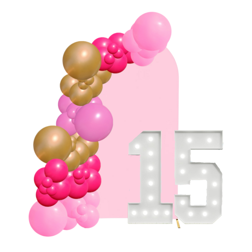 Balloon garland, backdrop, and marquee letters to elevate your party.