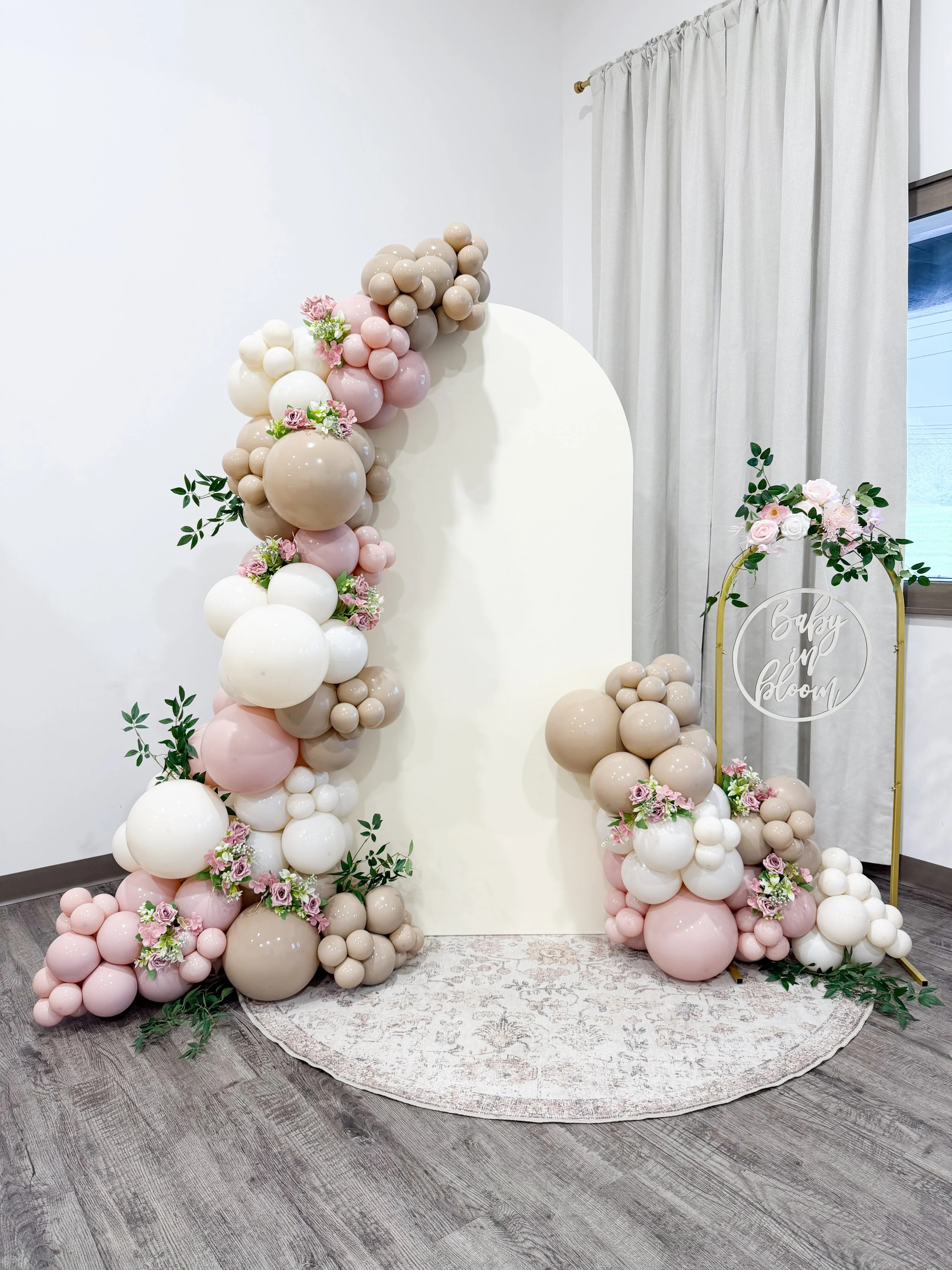 Custom balloon columns, organic garlands, and branded installations designed for businesses, gyms, restaurants, and special events throughout the Cleveland area.
