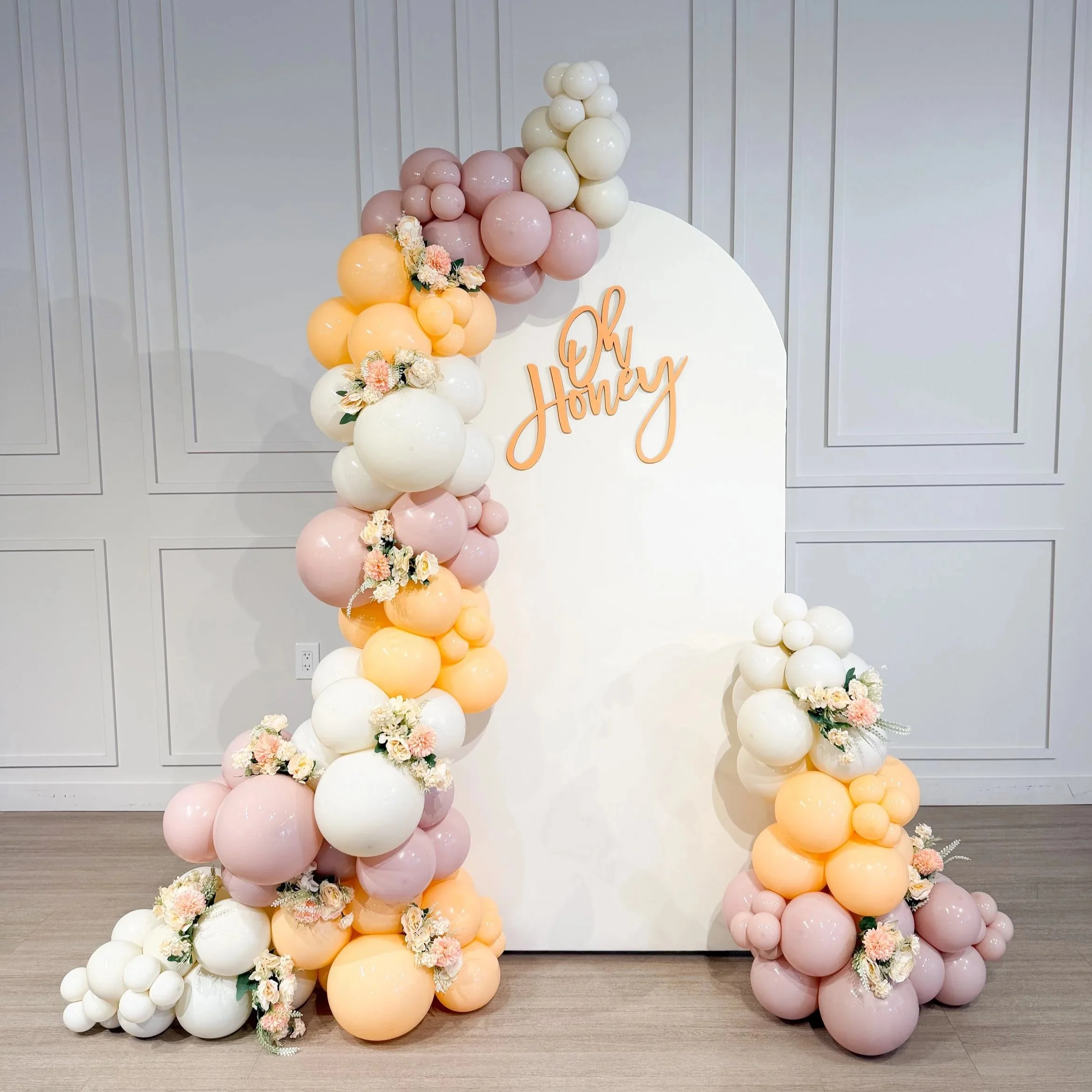 Custom organic balloon garland designed for an elegant birthday party setup in Northeast Ohio.