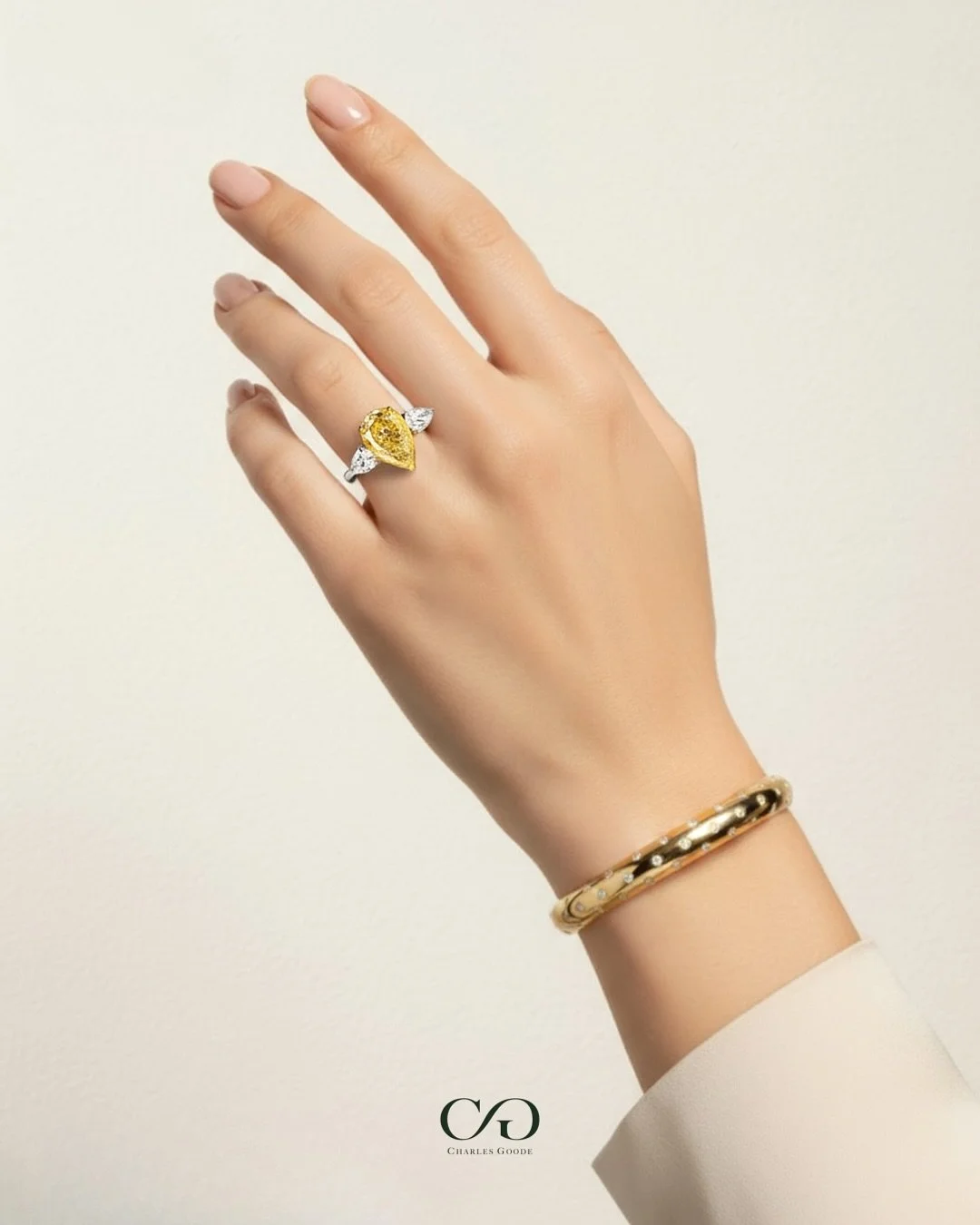 Introducing the Love Bangle by Charles Goode, launching on November 1st. Available exclusively online or by appointment.
Celebrate love in all its forms with our perfectly proportioned hinge clasp bangle, designed for ultimate comfort.
Featuring a