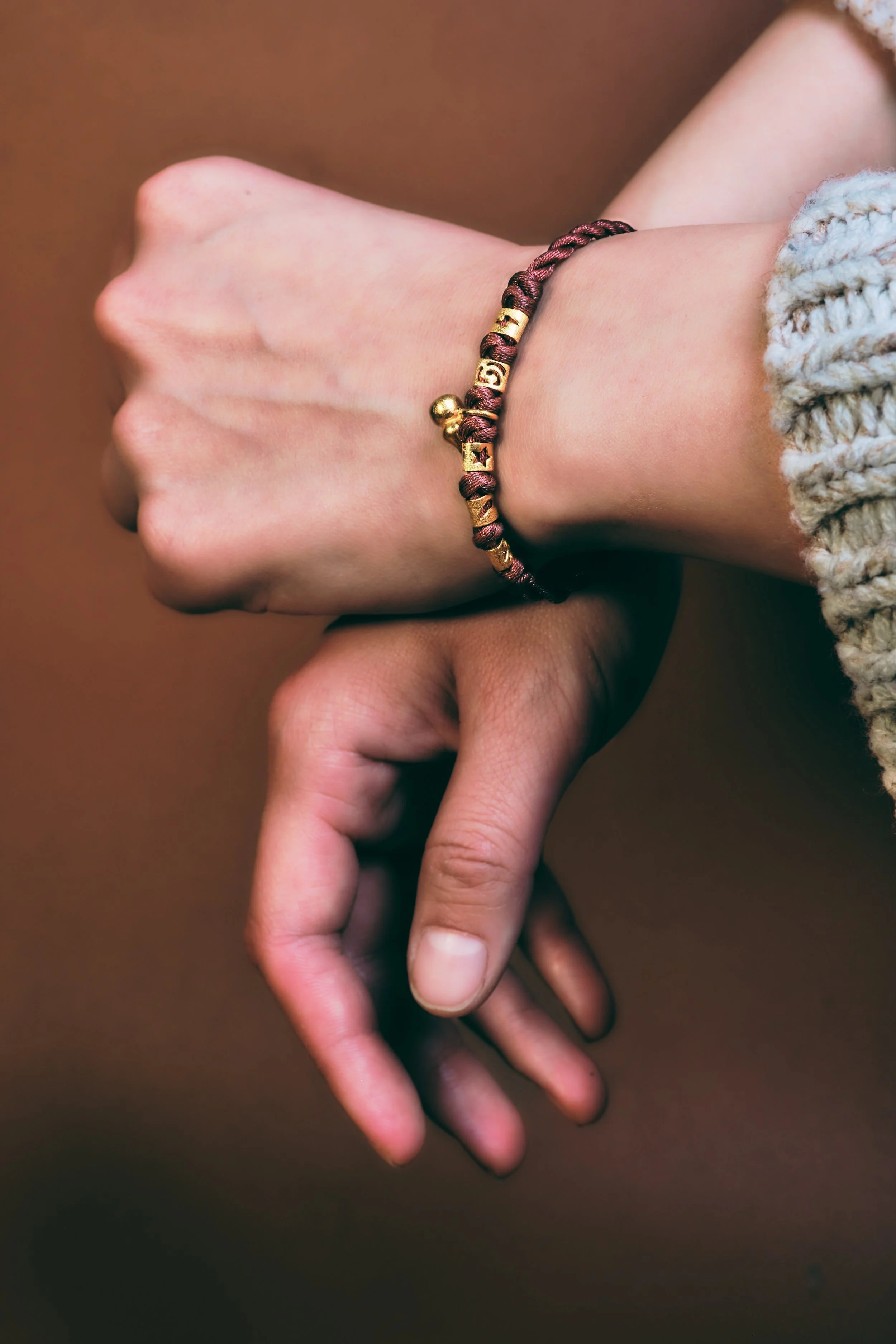 Hands and wrists with bracelet. JSnaps Product E-commerce Commercial Photography New York City 