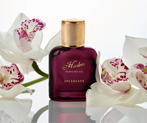 speakeasy perfume with orchids.png