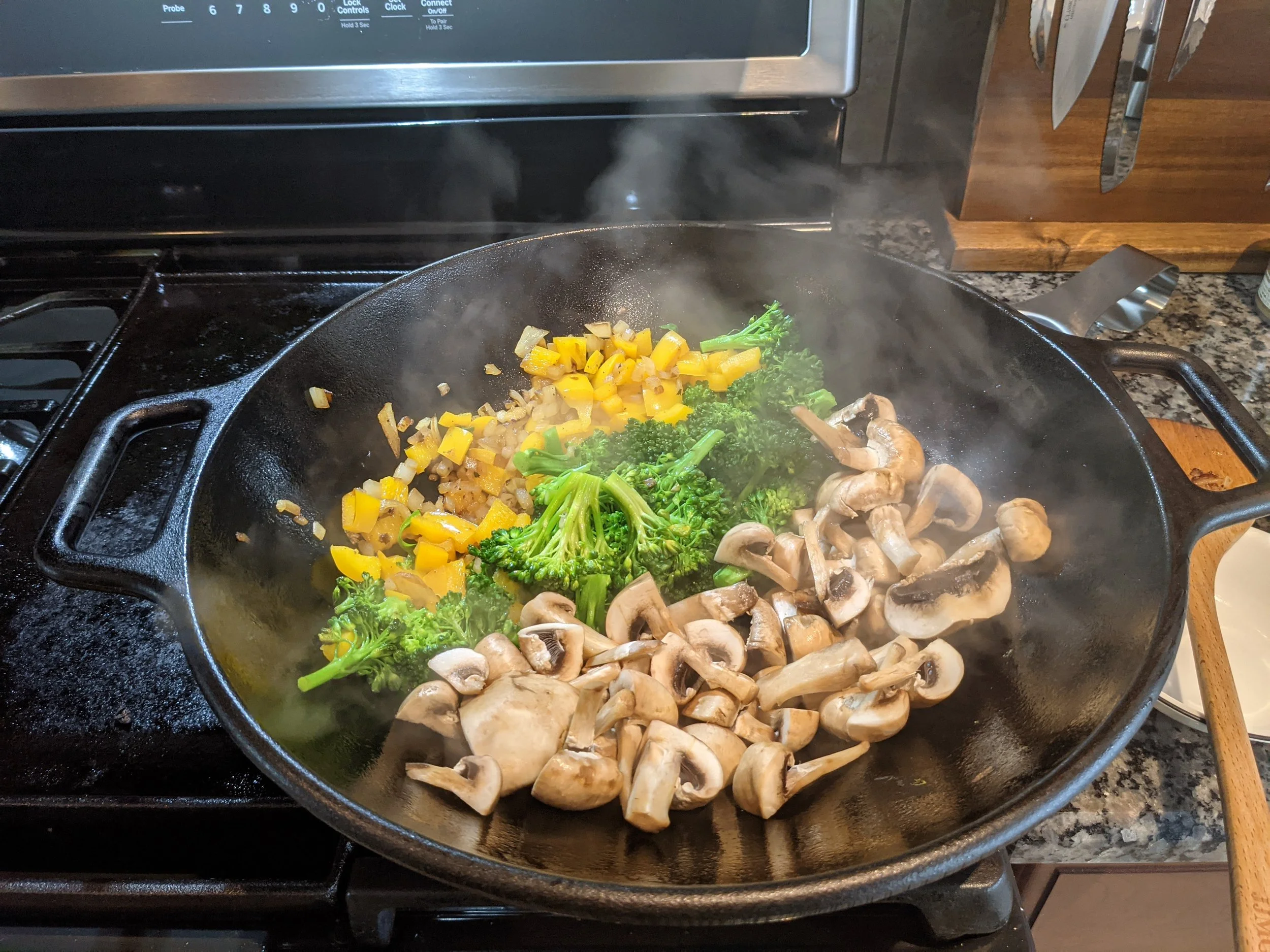 cast iron wok with veggies