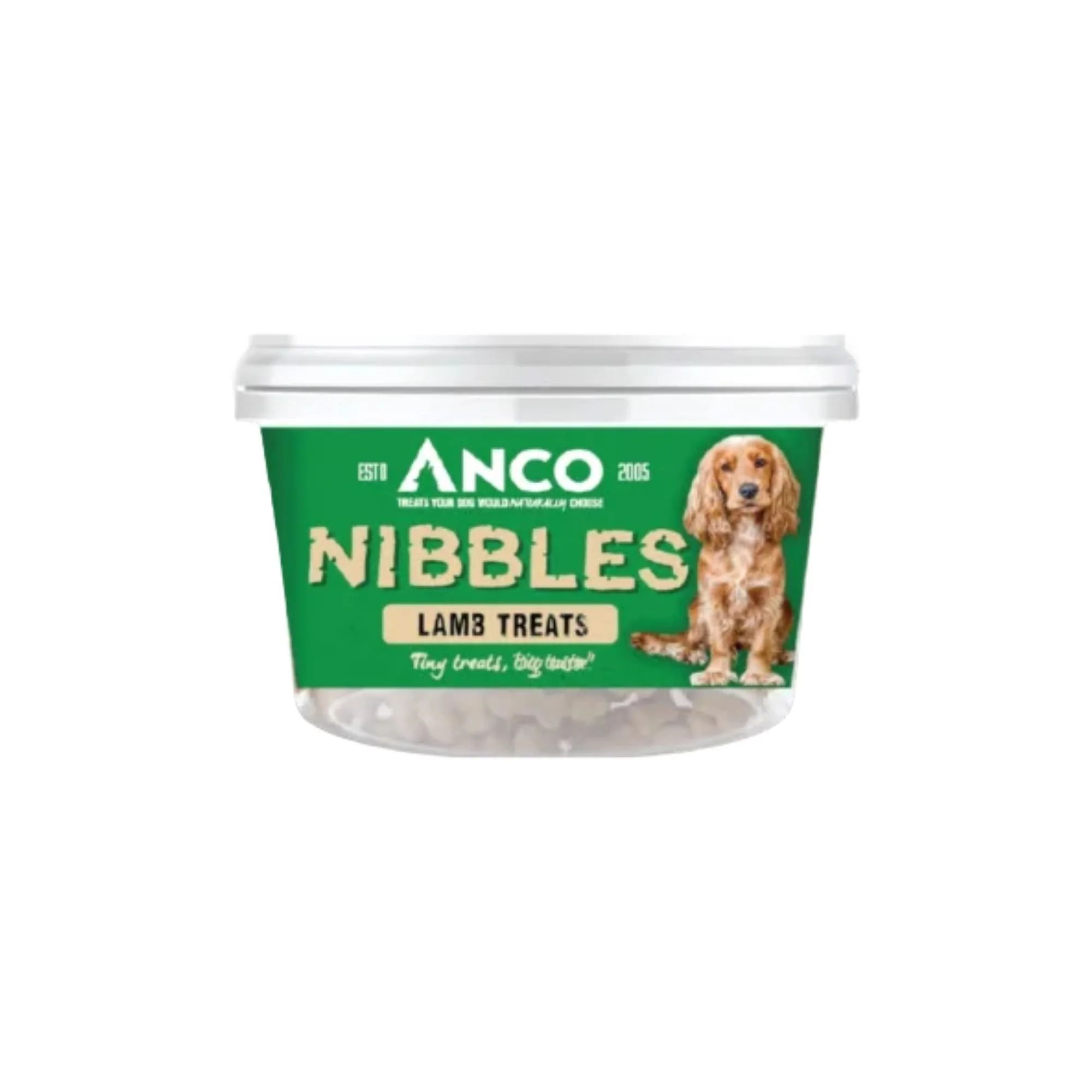 Clear plastic tub of Anco Nibbles Lamb Treats for dogs featuring a green label on a plain white background.