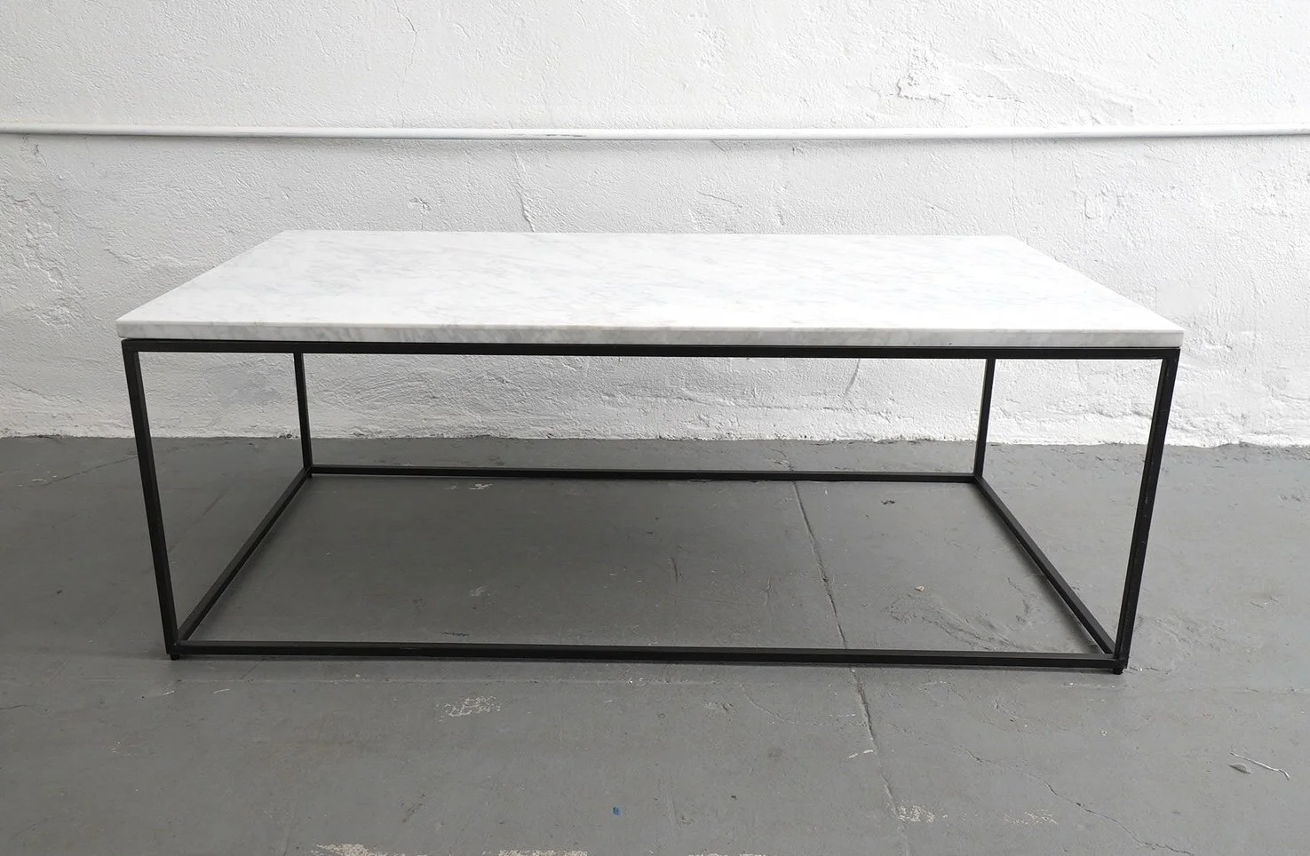Marble Streamline Coffee Table, $175, H:15" x W36" x D:36"