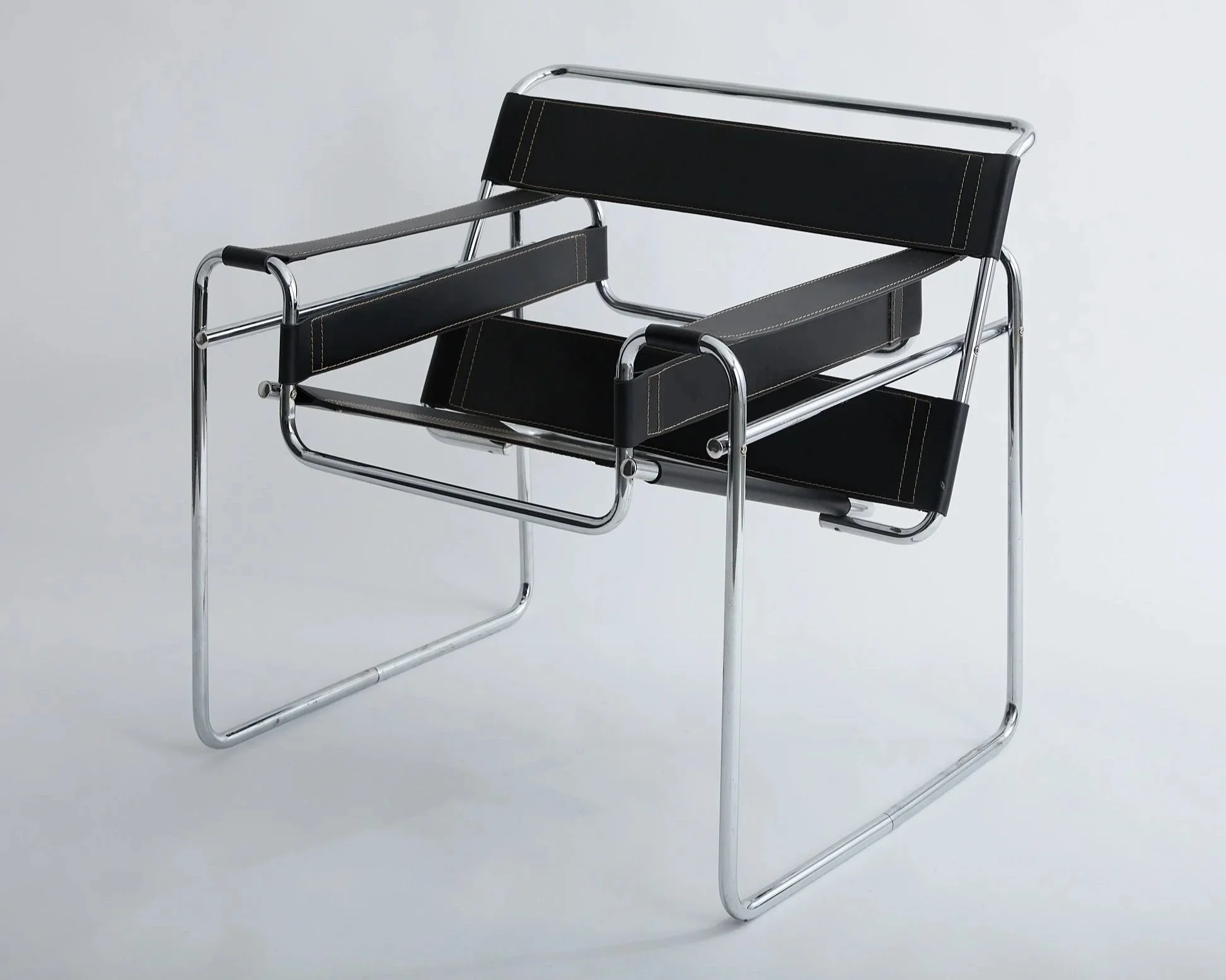 BLACK LEATHER WASSILY CHAIR, $250,
H29" X W32" X D29",
2 AVAILABLE