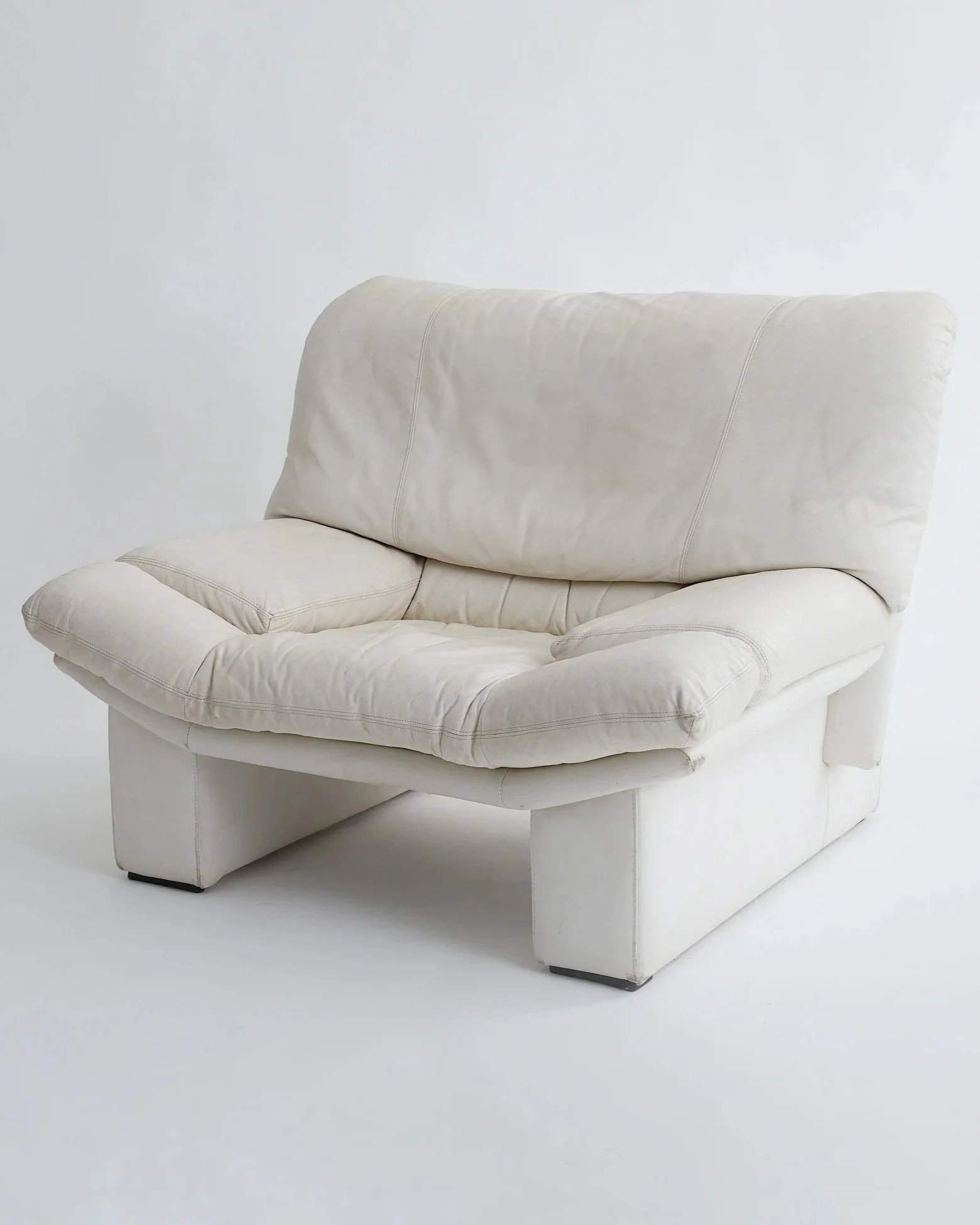 WHITE LEATHER CHAIR,  $200,
H31" X W40" X D34"