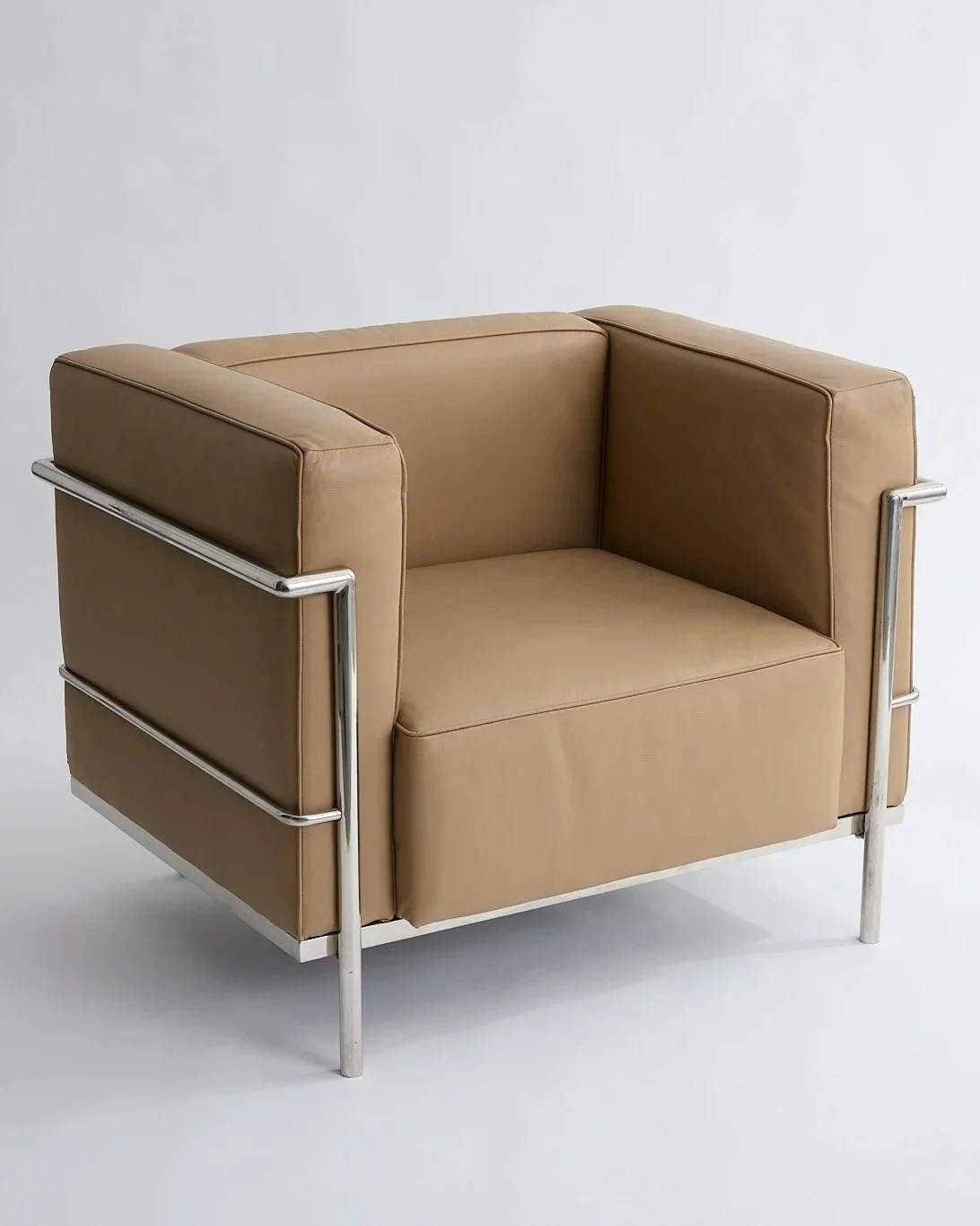 TAN LEATHER CLUB CHAIR, $150,
H29" X W34" X D27"