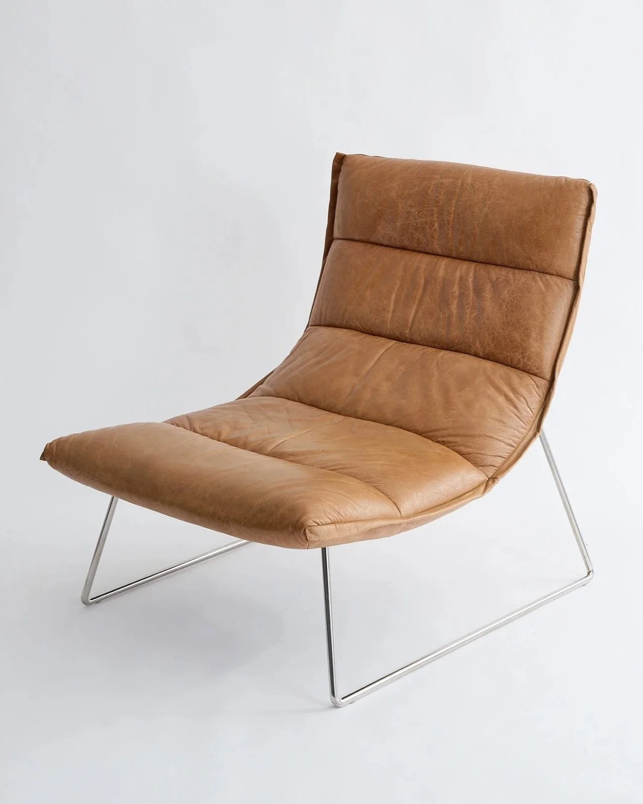 BROWN LEATHER CHANEL CHAIR, $200,
H34" X W26" X D33",
2 AVAILABLE