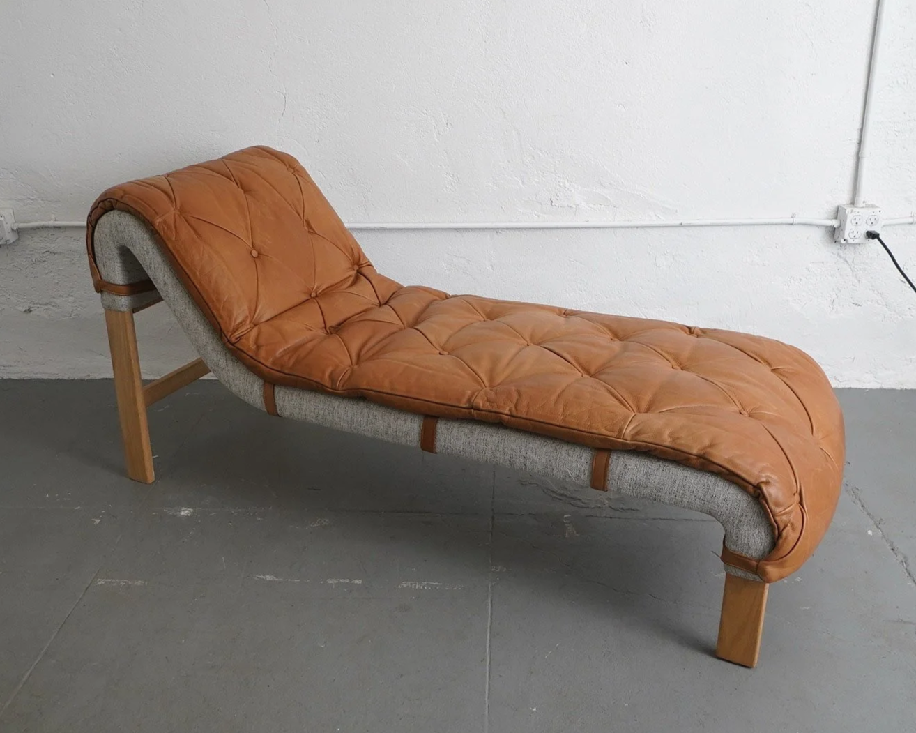 Tufted Leather Chaise Lounge, $250, H32" x W25" x D70"
