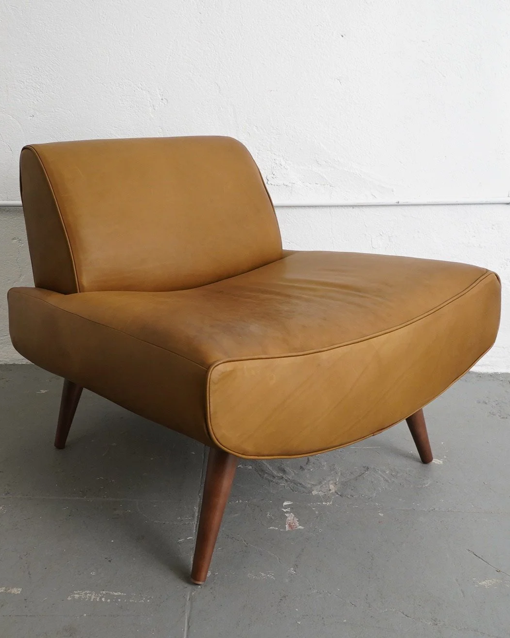 MCM Leather Armless Chair, $180, H30" x W32" x D32", 2 Available