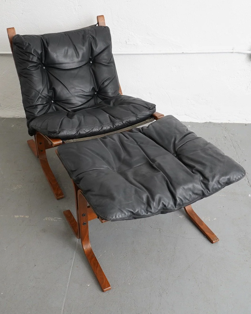 Black Leather Chair & Ottoman, $350, H32" x W24" x D32"