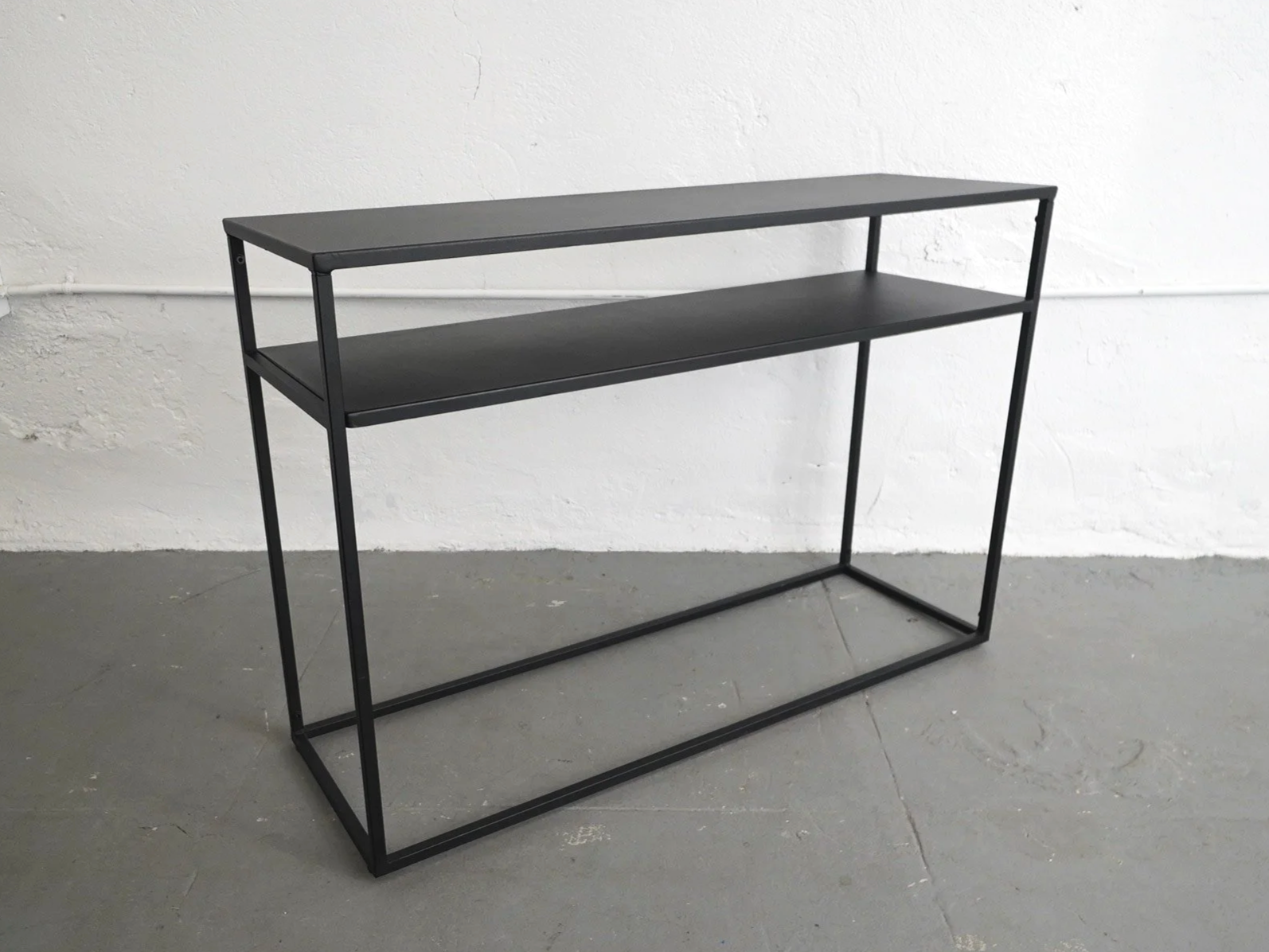 Black Metal 2-Tier Console Table, $45, H30" x W44" x D14, 1 Total