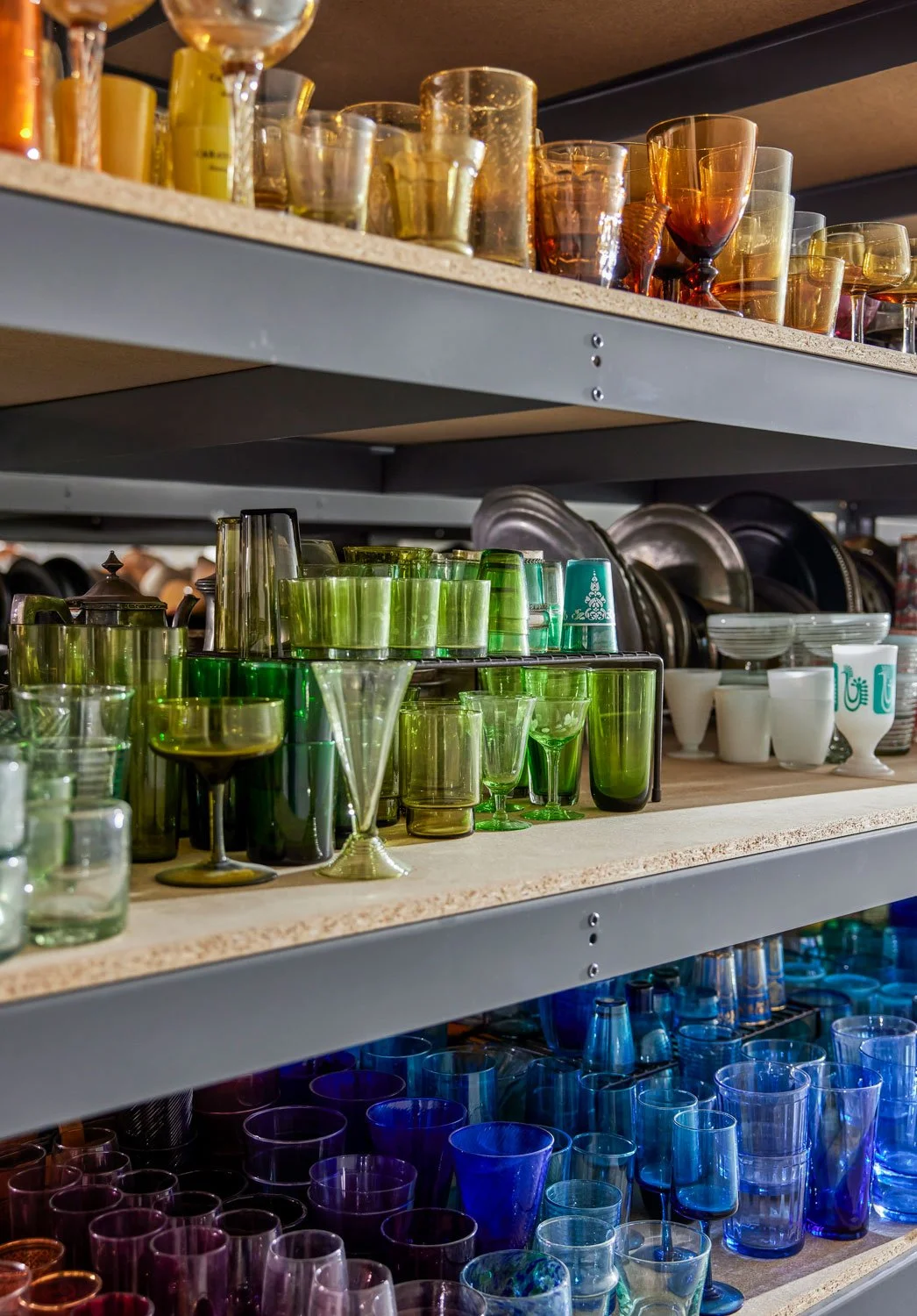 Tangerine-prop-shop-studio-props-color-glassware-shelf.jpg