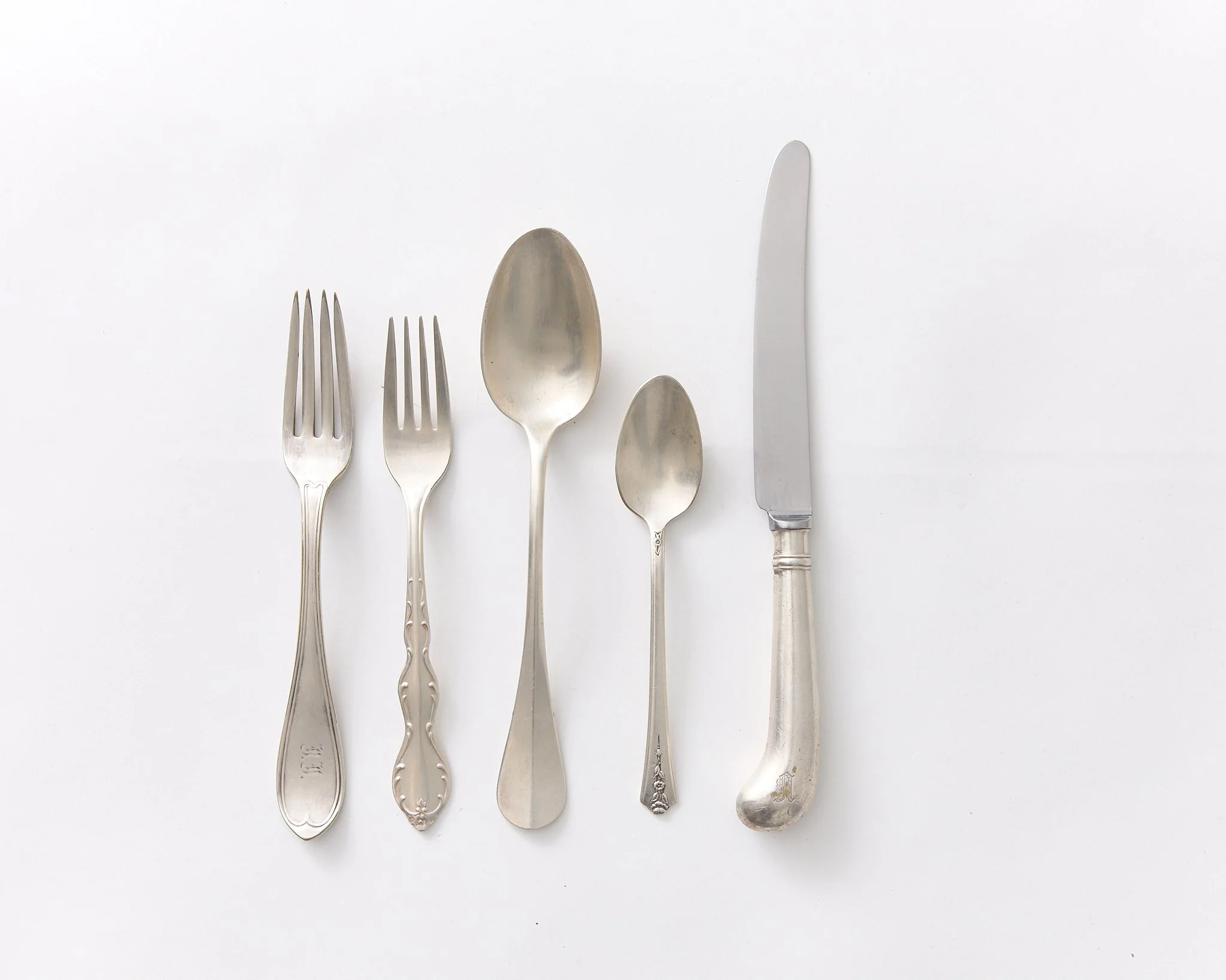 DINNER FORK, SALAD FORK, DINNER SPOON, DESSERT SPOON & DINNER KNIFE, 200 EACH TOTAL,  $2 EACH (MIXED STYLES OF VINTAGE SILVER-PLATED FLATWARE)