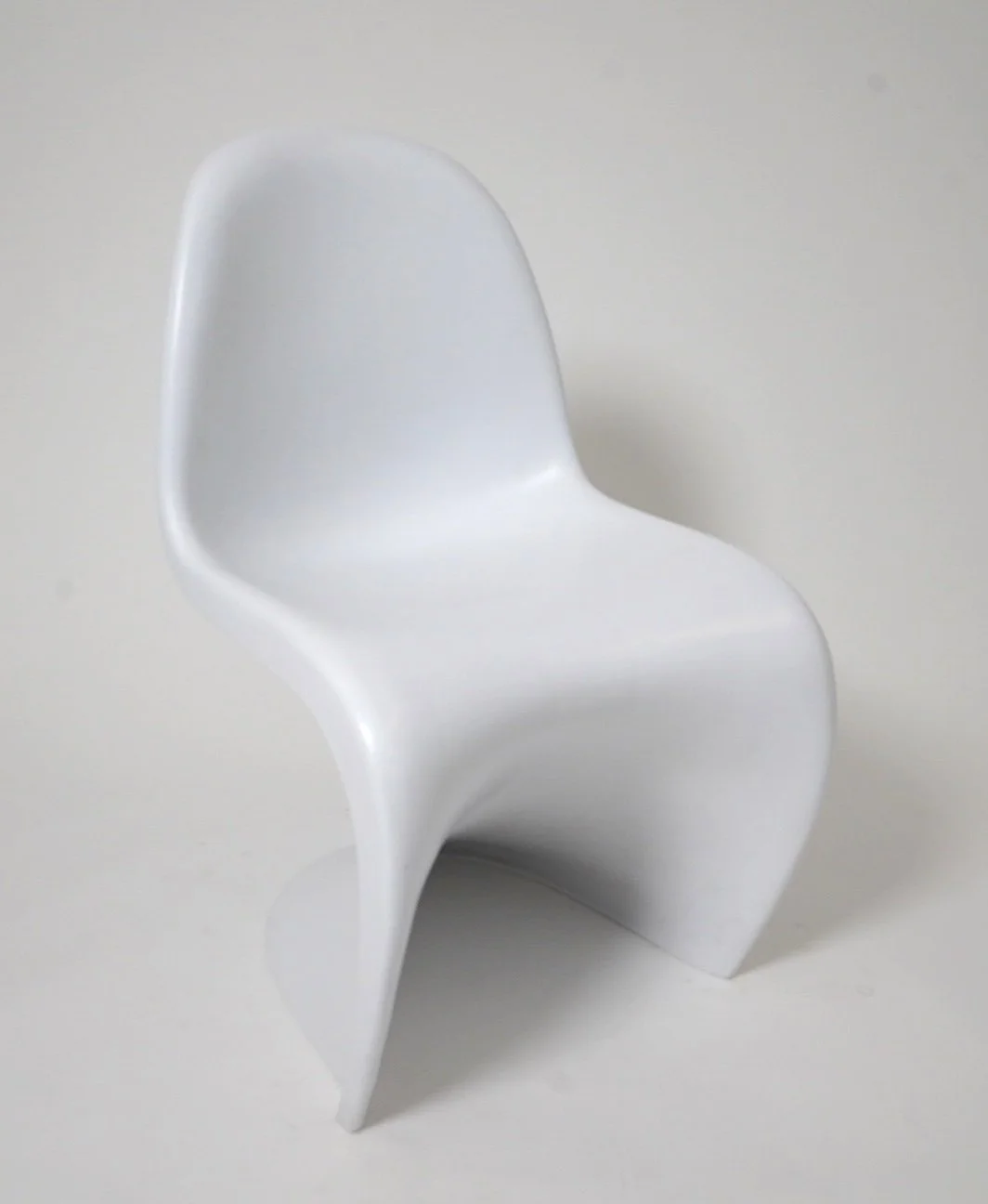 White Panton Molded Chair, $125, H34" x W19" x D22", 4 Total 