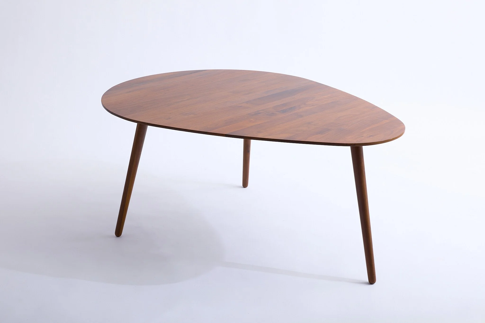 Irregular Walnut Coffee Table, $80, H18" x W42" x D42", Single