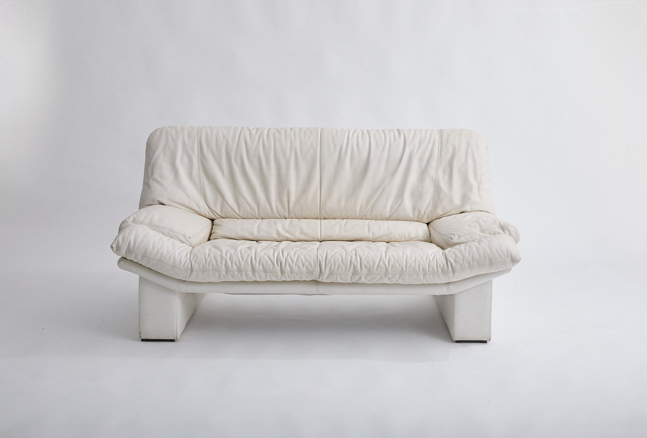 WHITE LEATHER Salotti LOVESEAT, $300, H34" X W64" X D36"