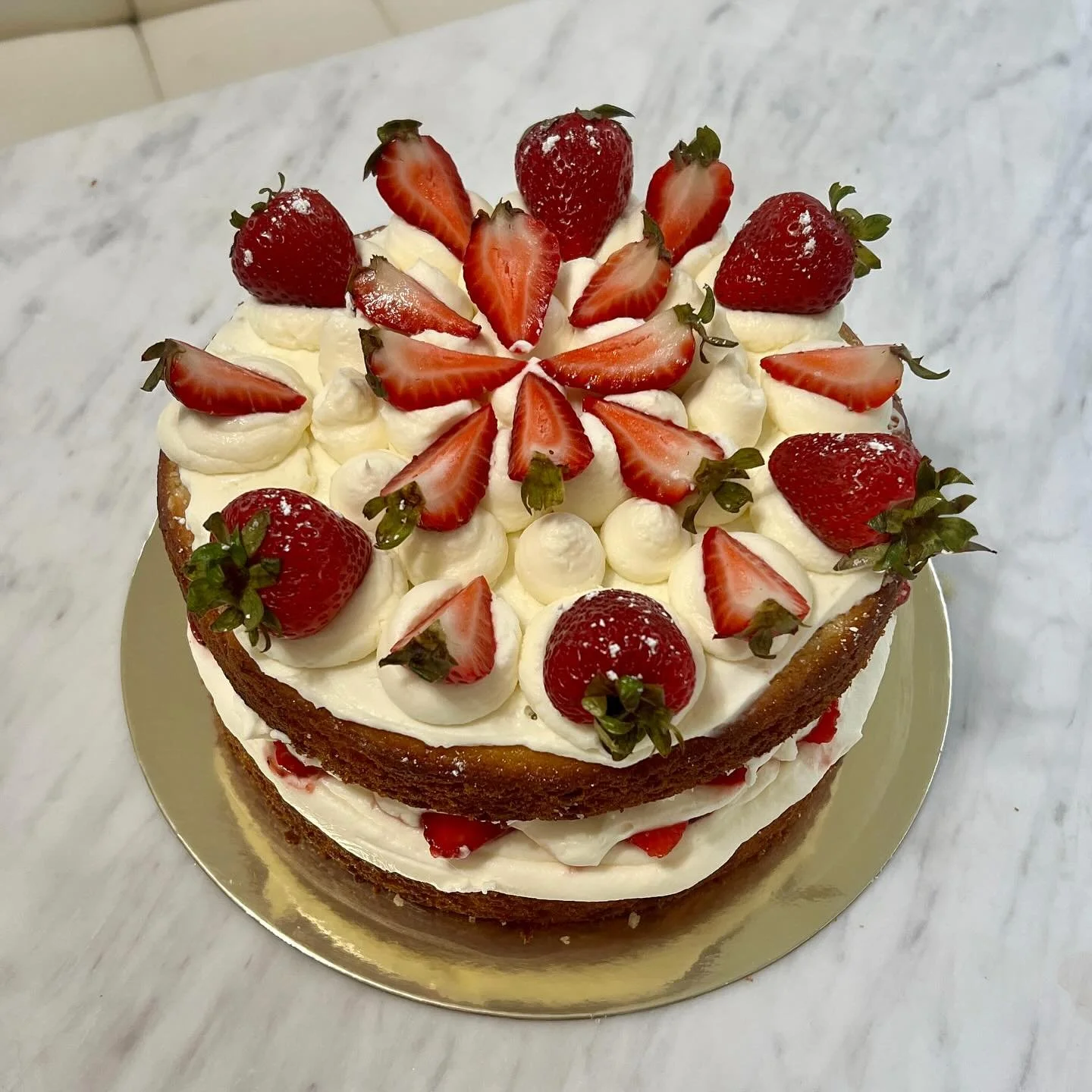 For the strawberry lovers 🫶🏼 Fresh berries tossed in homemade jam, layered with whipped cream cheese frosting to keep things stable and just sweet enough 🍓✨

#bostonbakes #homemadecake #homemadebake #bostoneats #bostonsmallbusiness #berryseason #s