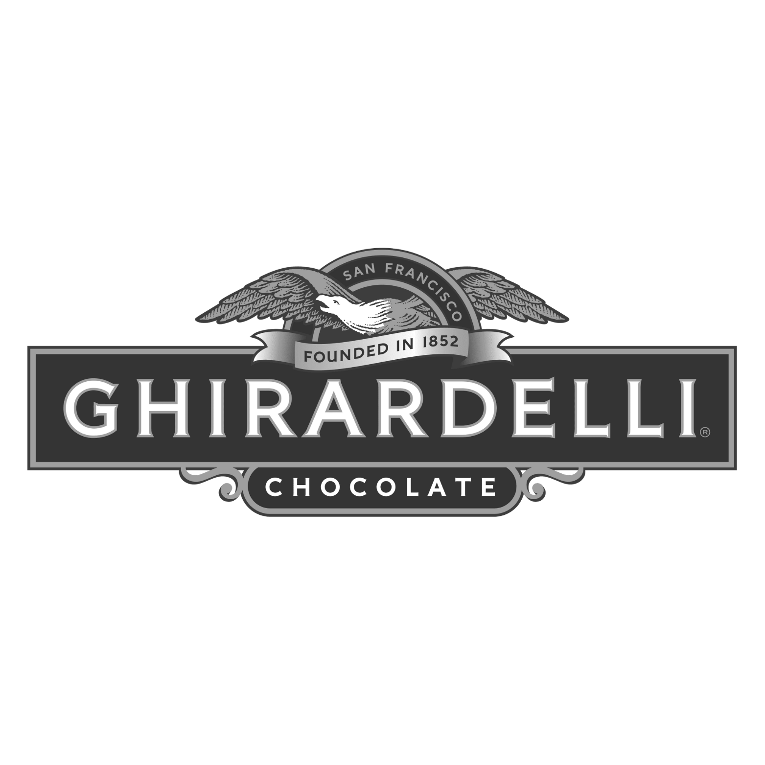 Black and white logo of Ghirardelli Chocolate, featuring an eagle with outstretched wings and text indicating it was founded in 1852 in San Francisco.