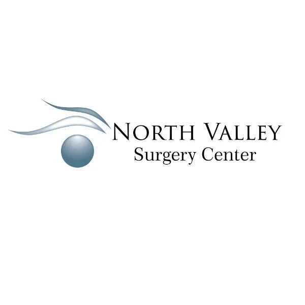 Logo of North Valley Surgery Center featuring stylized swoosh design and a sphere, with the name in elegant black font.