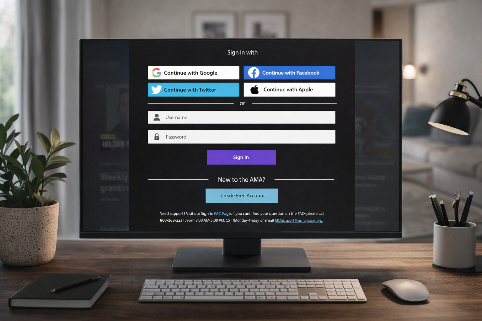 Desktop monitor displaying the Single Sign-On sign-in screen with social login options and username and password fields