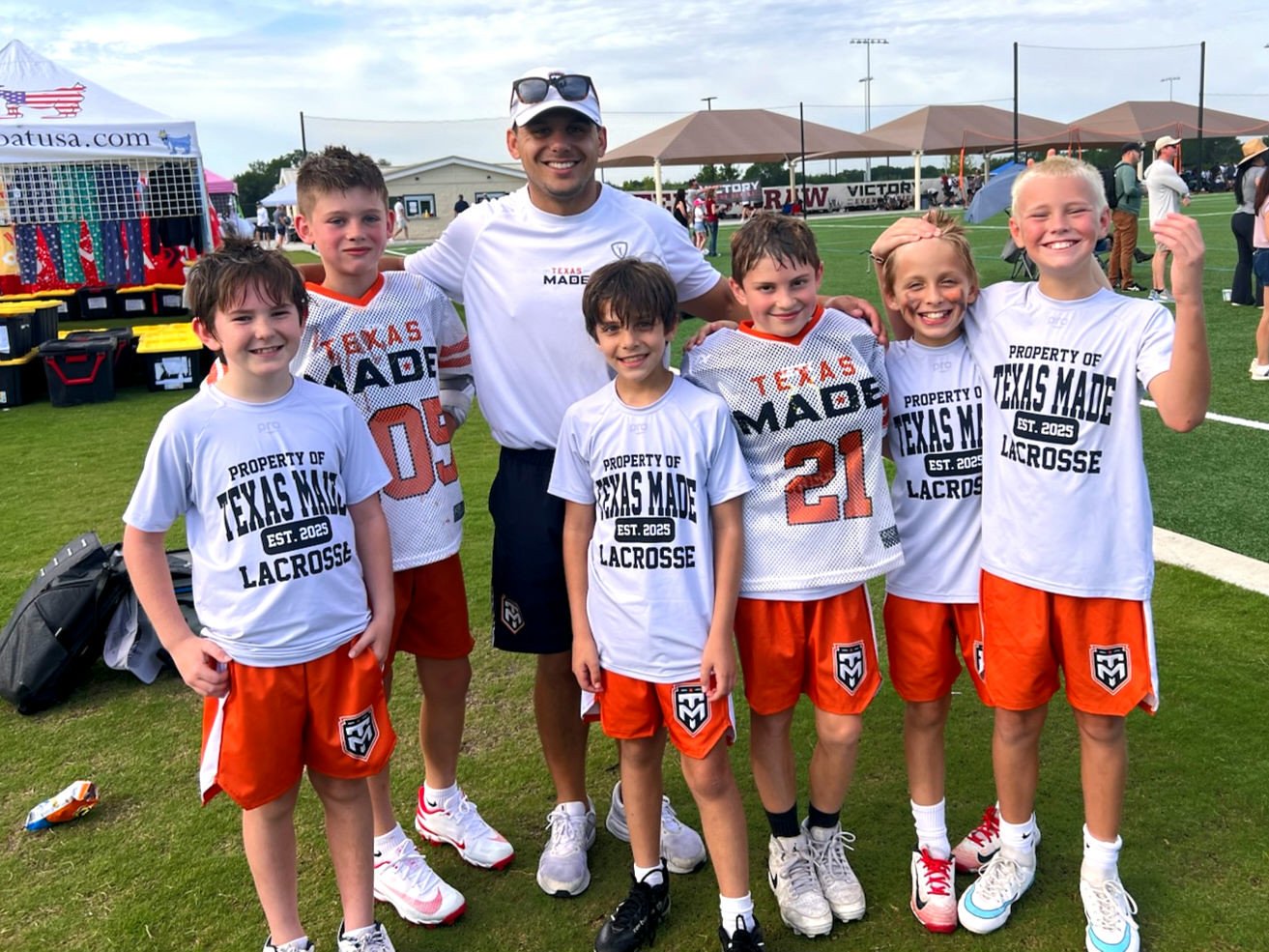 Ed Torriero, director of Texas Made in a white polo on a lacrosse field 