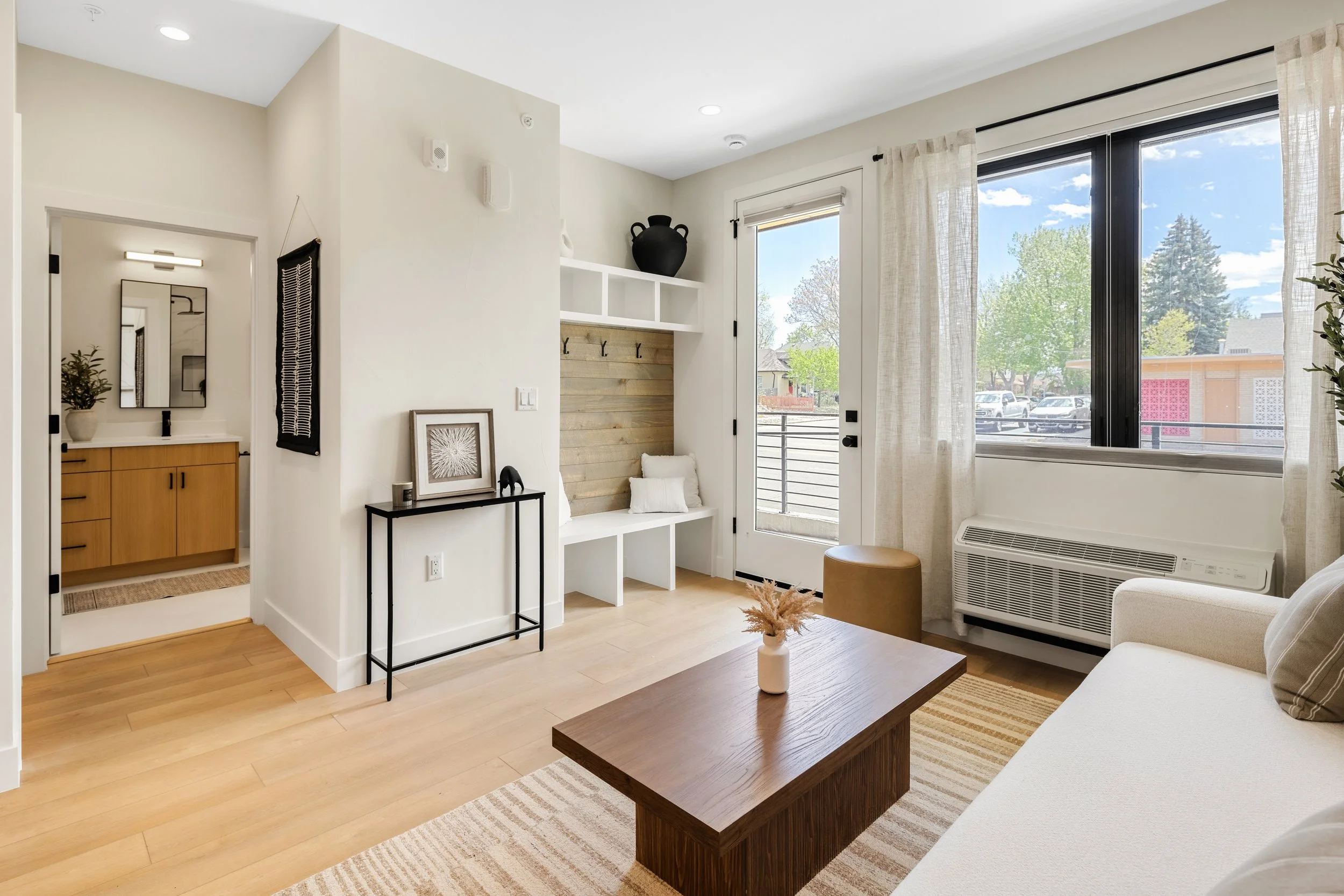 512 SF 1-bed apartment kitchen at Berkeley Residences showing modern appliances, quartz countertops, and minimalist design in Denver