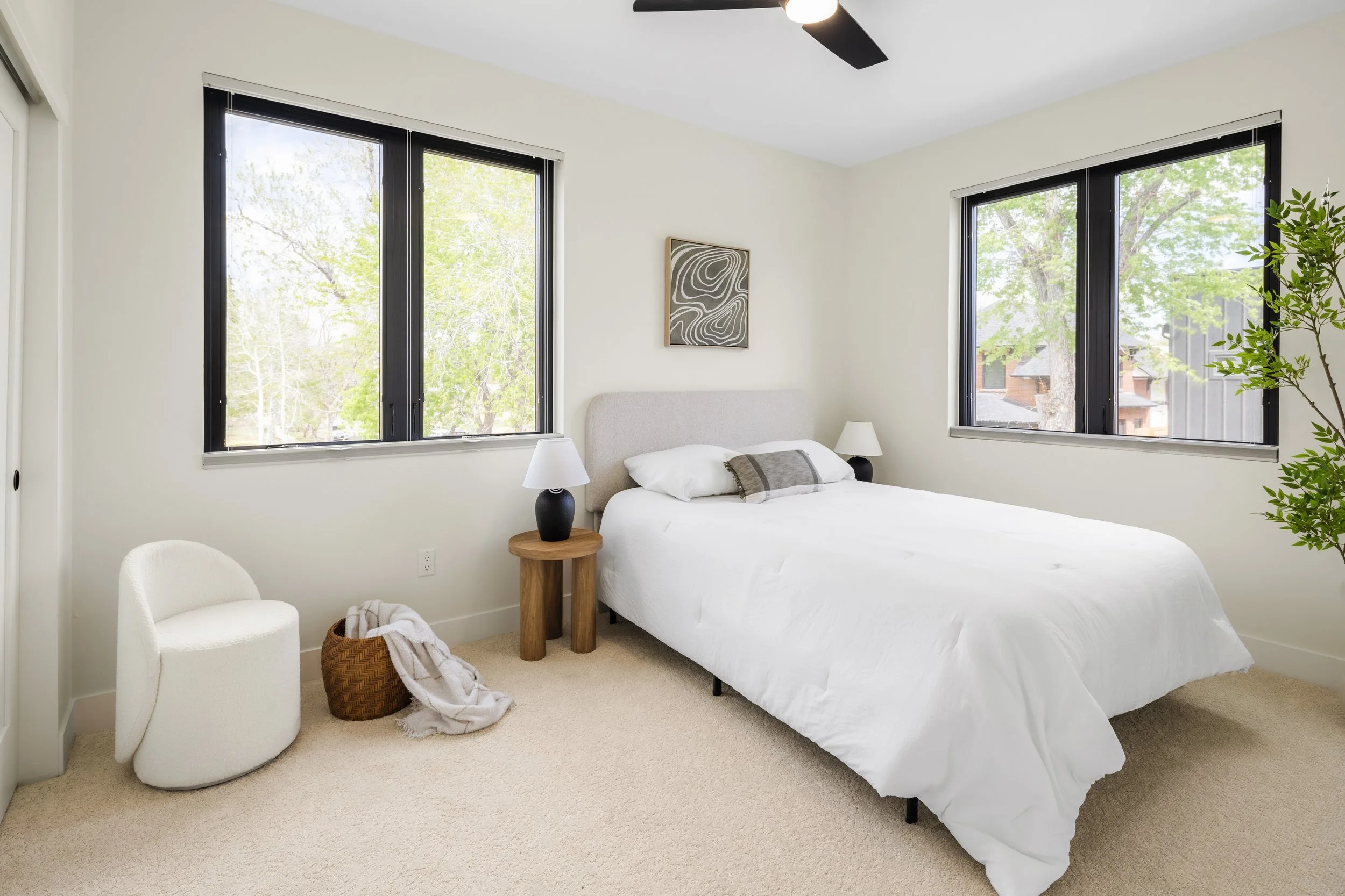 Second bedroom in 1,352 SF two-bedroom unit at Berkeley Residences Denver luxury condo with modern fixtures