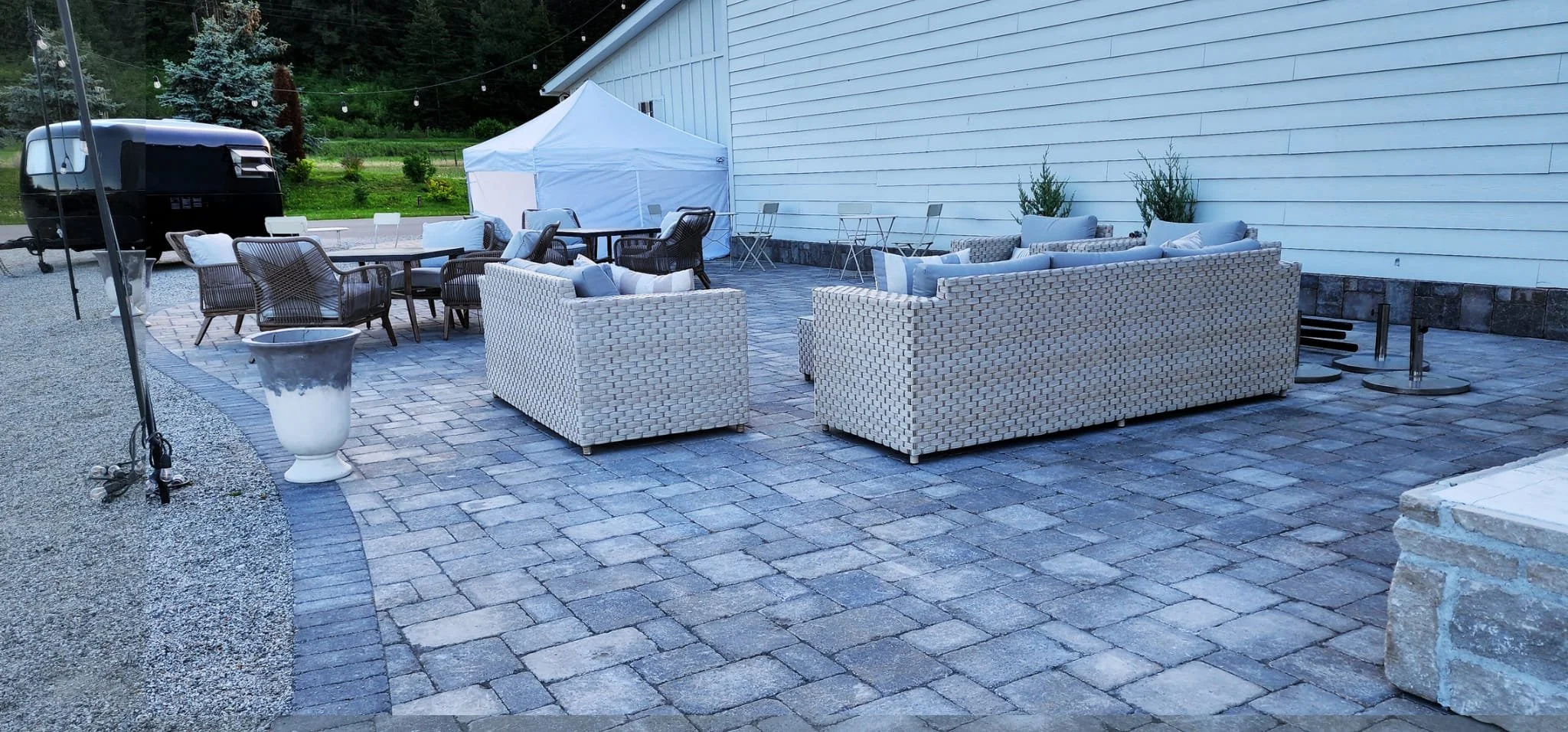 Natural stone patio and outdoor living space installation in Armstrong BC.