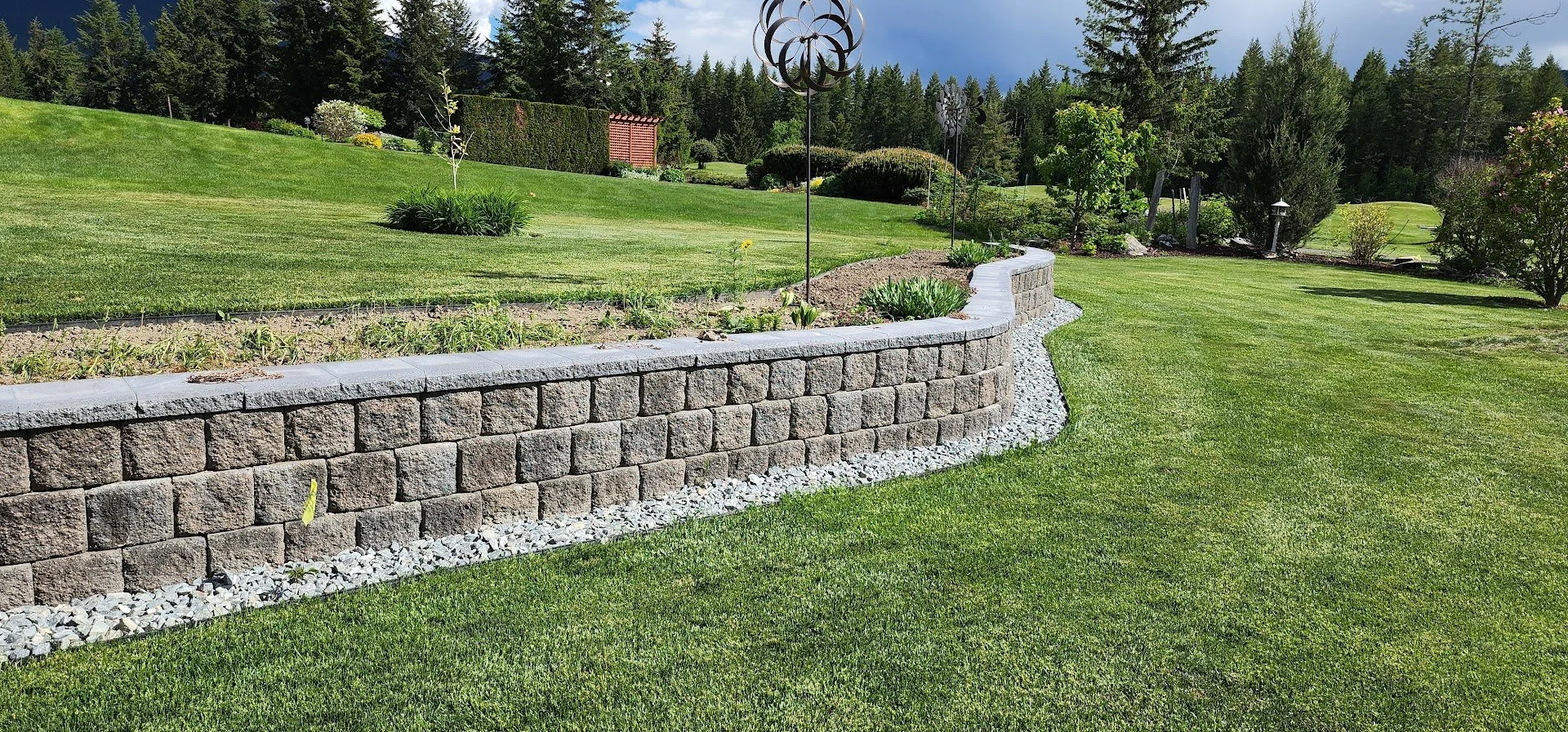 Retaining wall repair and reconstruction project completed in Armstrong BC to improve drainage and long-term stability.