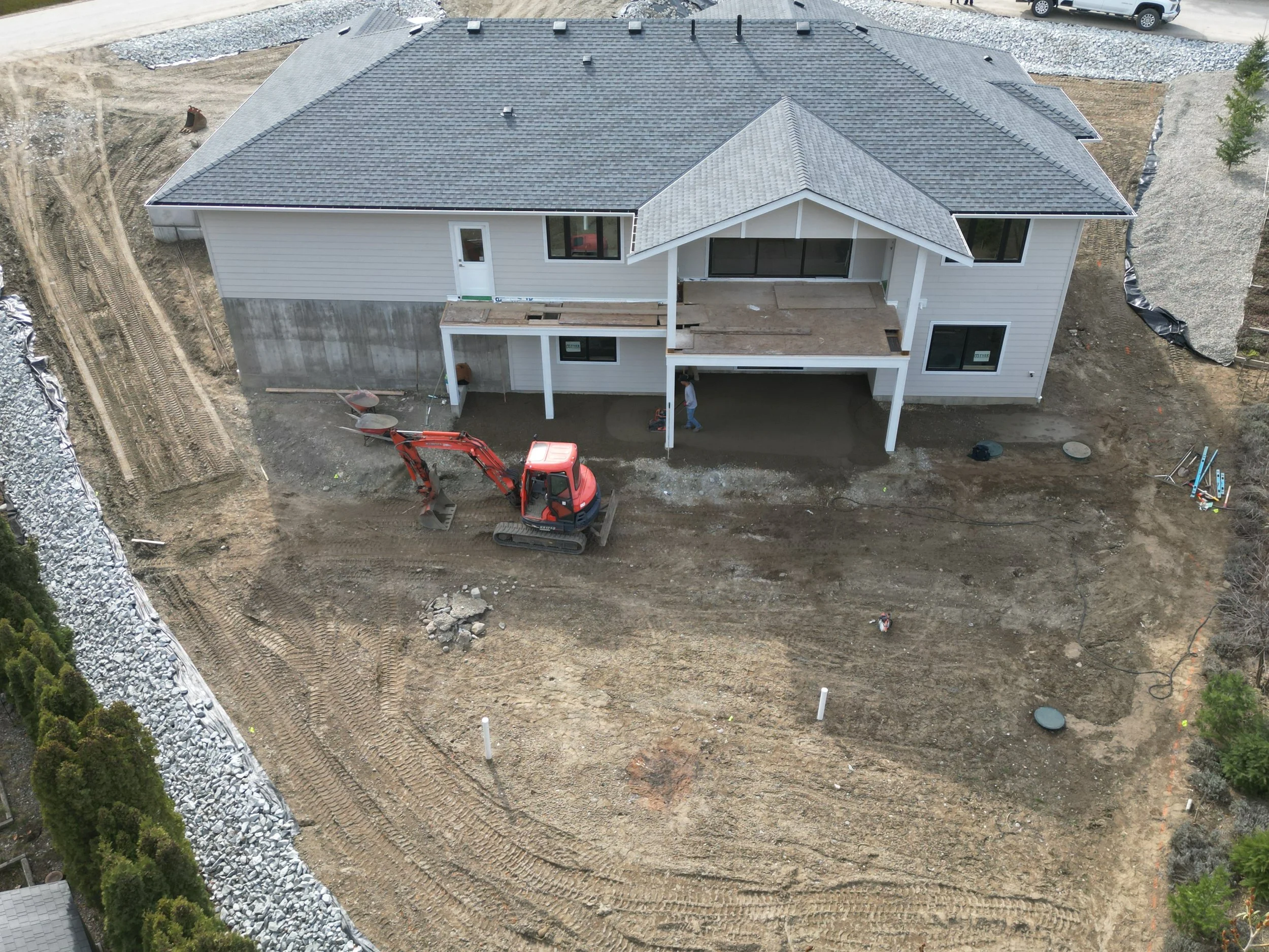 New construction home before landscape installation in Blind Bay BC