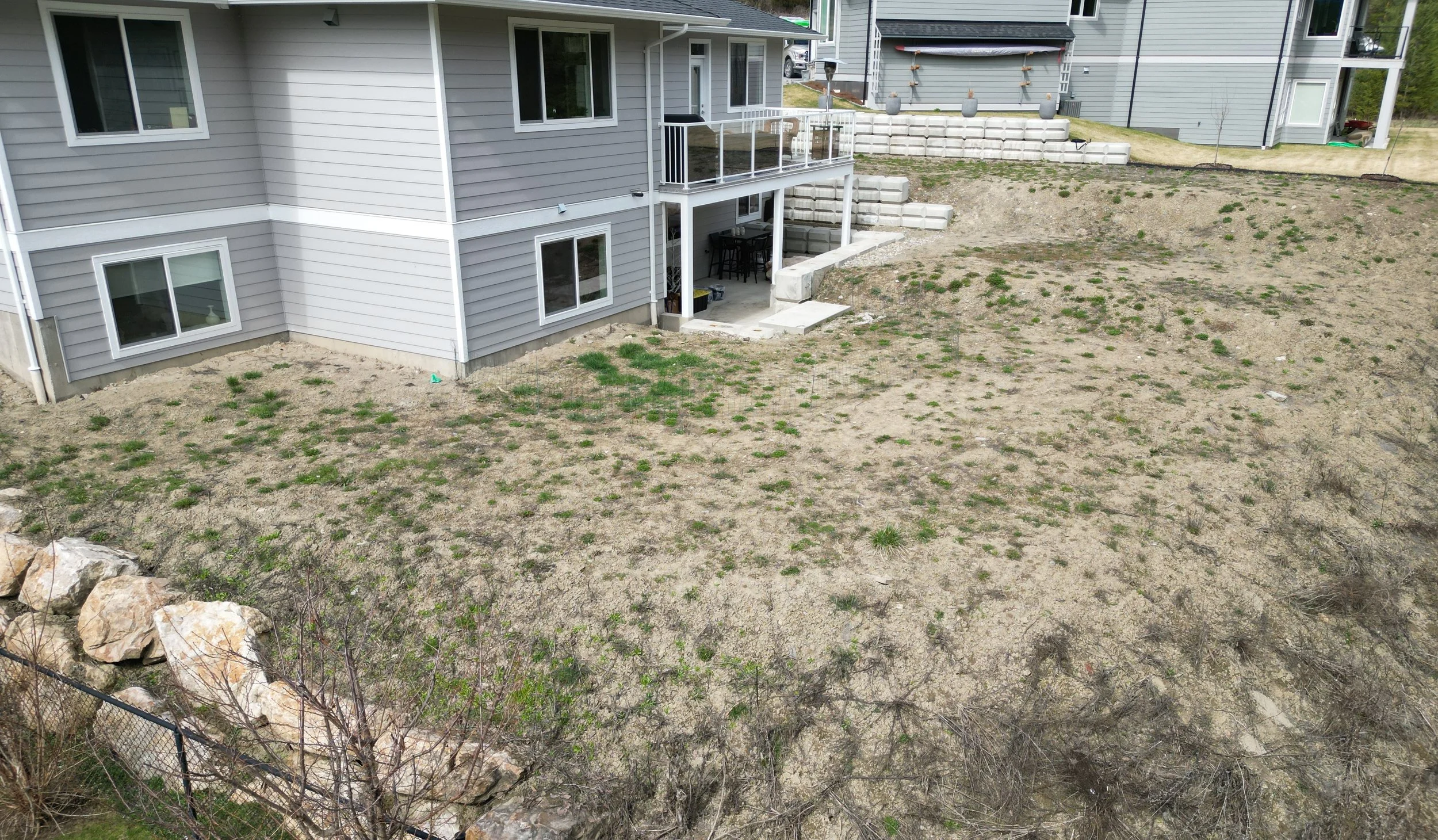 New construction backyard before landscape installation in Blind Bay BC