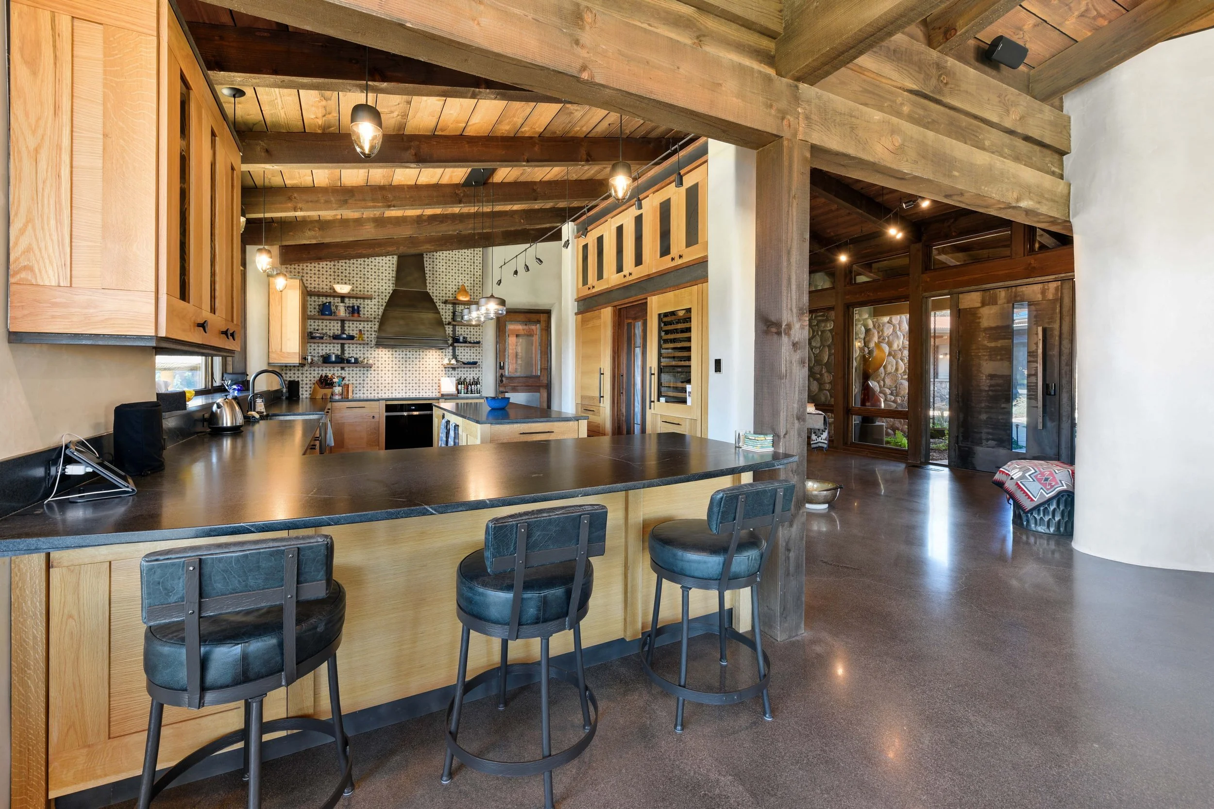 Rustic exposed timber framing southwest kitchen